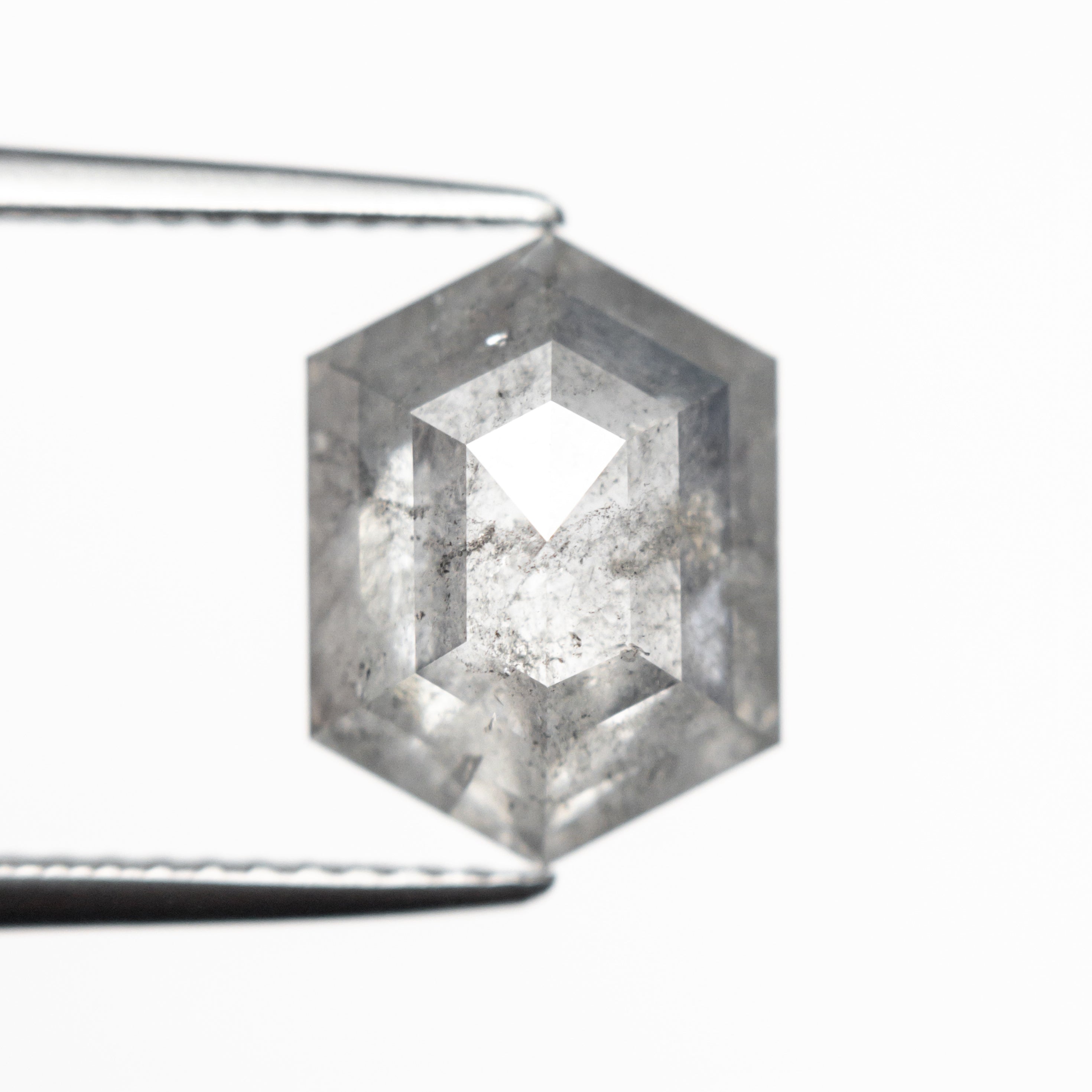 The 3.75ct 11.28x8.38x4.62mm Hexagon Step Cut 23841-07 by East London jeweller Rachel Boston | Discover our collections of unique and timeless engagement rings, wedding rings, and modern fine jewellery.