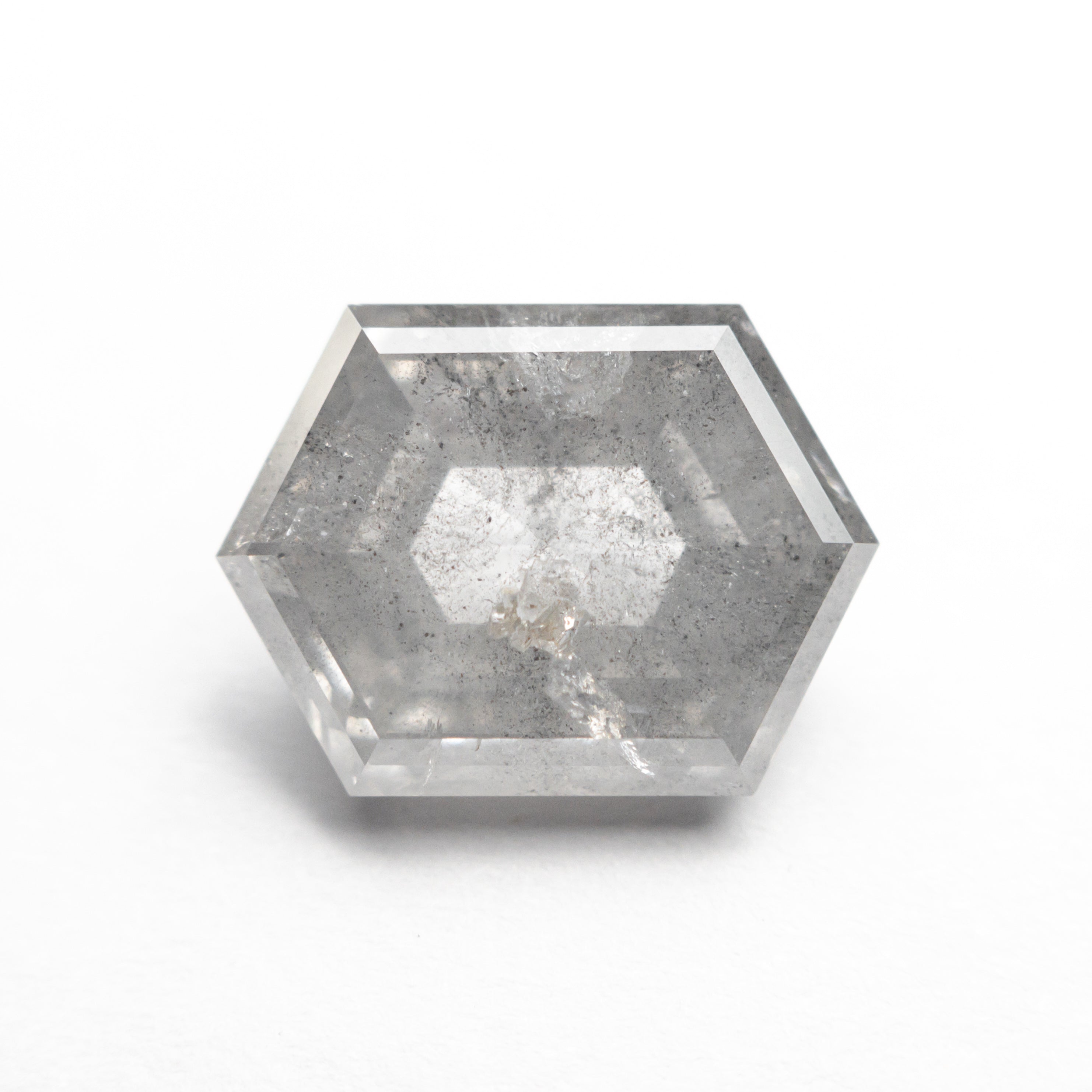 The 3.75ct 11.28x8.38x4.62mm Hexagon Step Cut 23841-07 by East London jeweller Rachel Boston | Discover our collections of unique and timeless engagement rings, wedding rings, and modern fine jewellery.