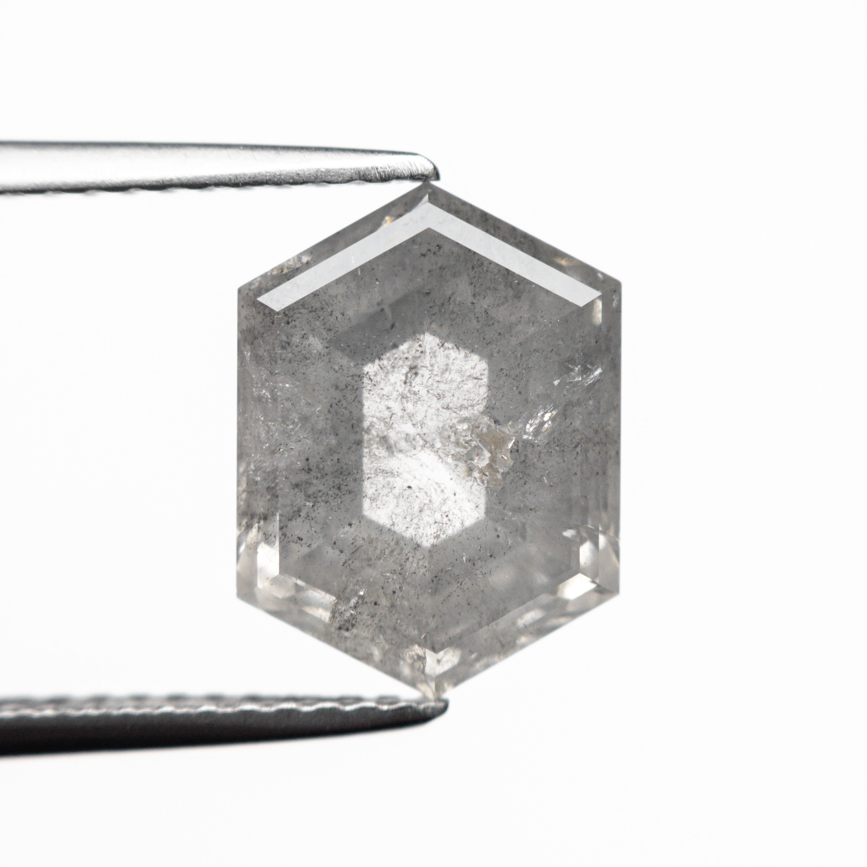 The 3.75ct 11.28x8.38x4.62mm Hexagon Step Cut 23841-07 by East London jeweller Rachel Boston | Discover our collections of unique and timeless engagement rings, wedding rings, and modern fine jewellery.
