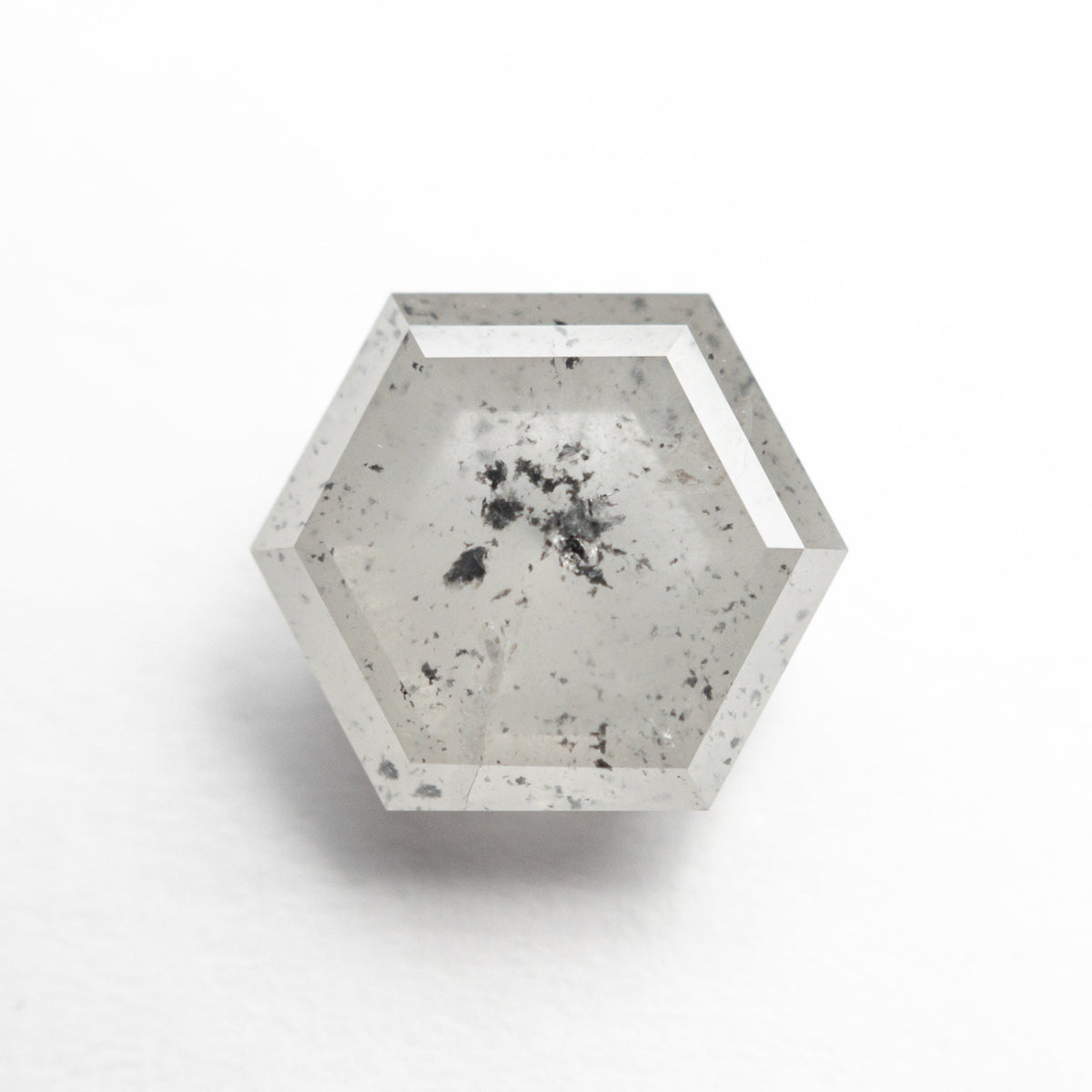 The 3.59ct 9.88x8.59x4.71mm Hexagon Step Cut 23841-08 by East London jeweller Rachel Boston | Discover our collections of unique and timeless engagement rings, wedding rings, and modern fine jewellery.