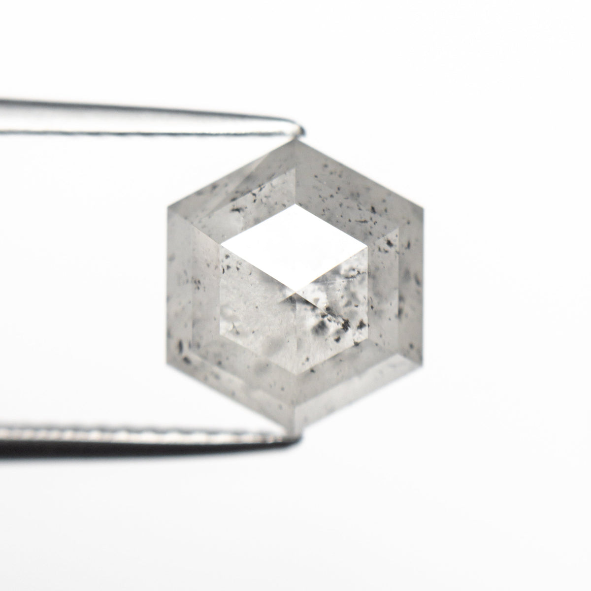 The 3.59ct 9.88x8.59x4.71mm Hexagon Step Cut 23841-08 by East London jeweller Rachel Boston | Discover our collections of unique and timeless engagement rings, wedding rings, and modern fine jewellery.