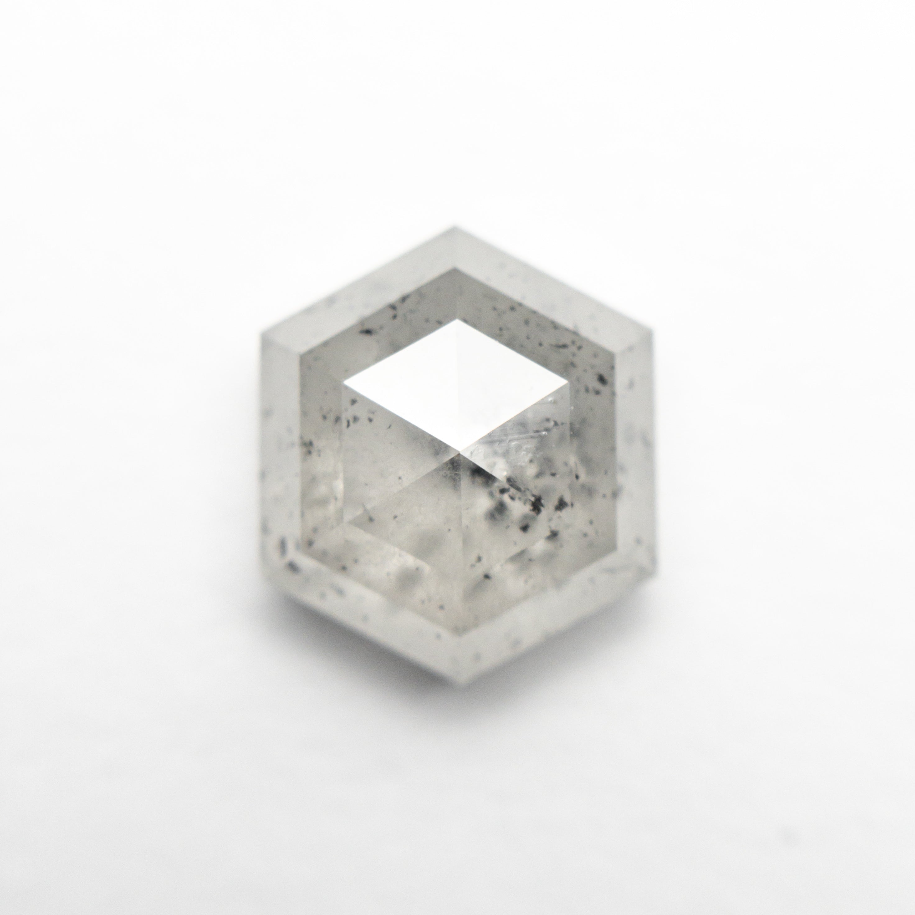 The 3.59ct 9.88x8.59x4.71mm Hexagon Step Cut 23841-08 by East London jeweller Rachel Boston | Discover our collections of unique and timeless engagement rings, wedding rings, and modern fine jewellery.
