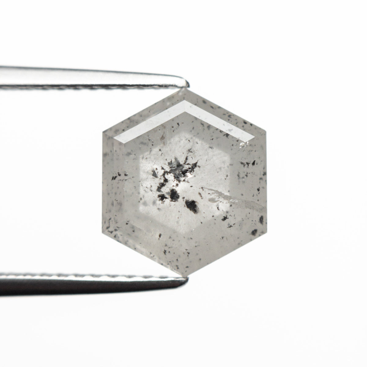 The 3.59ct 9.88x8.59x4.71mm Hexagon Step Cut 23841-08 by East London jeweller Rachel Boston | Discover our collections of unique and timeless engagement rings, wedding rings, and modern fine jewellery.