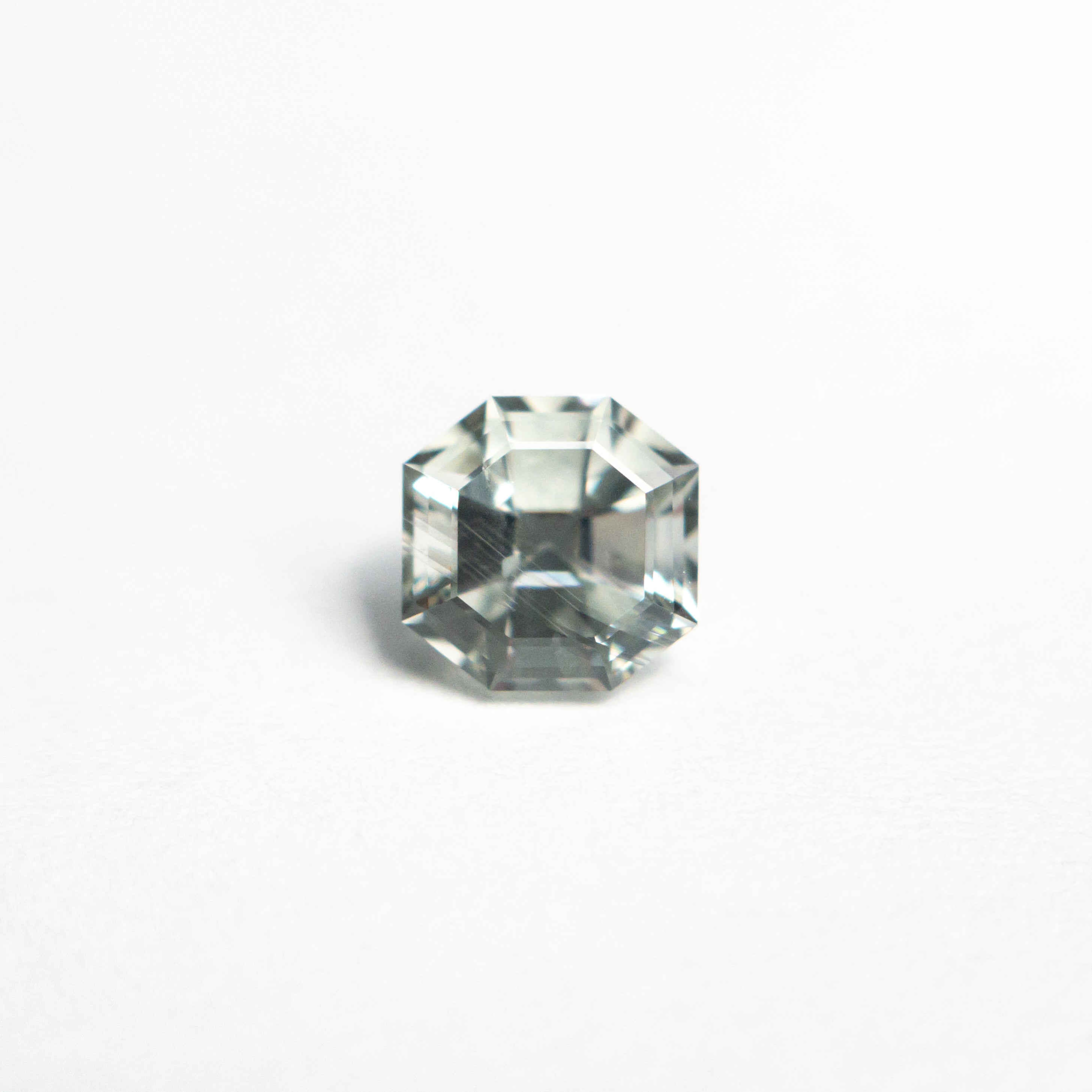 The 0.83ct 5.02x4.98x4.08mm Cut Corner Square Step Cut Sapphire 23903-08 by East London jeweller Rachel Boston | Discover our collections of unique and timeless engagement rings, wedding rings, and modern fine jewellery.