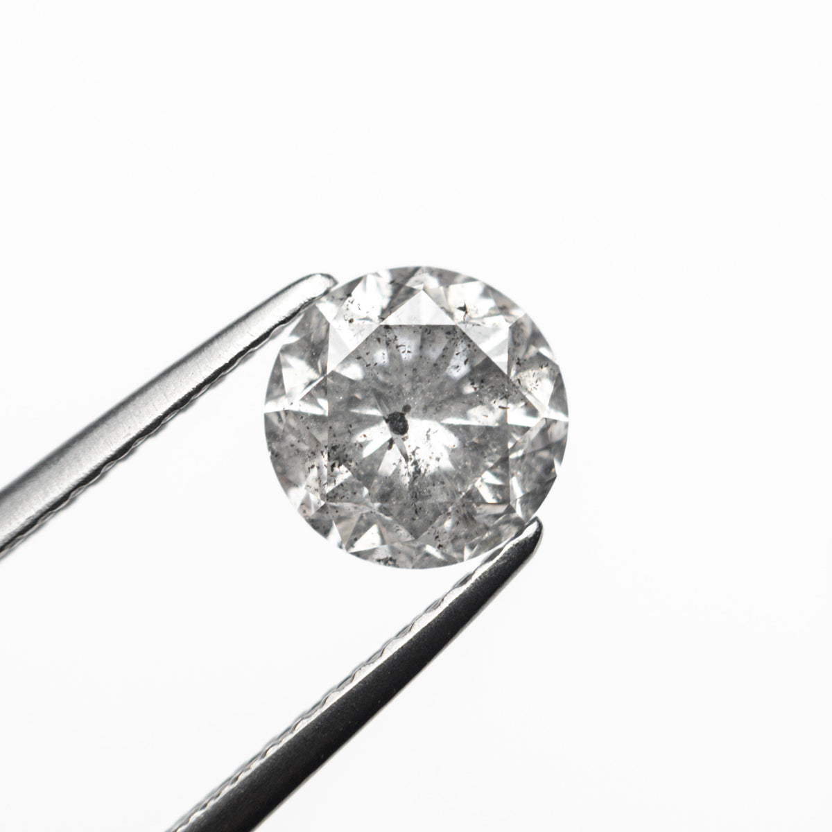 The 1.43ct 6.77x6.74x4.69mm Round Brilliant 🇨🇦 23984-01 by East London jeweller Rachel Boston | Discover our collections of unique and timeless engagement rings, wedding rings, and modern fine jewellery.