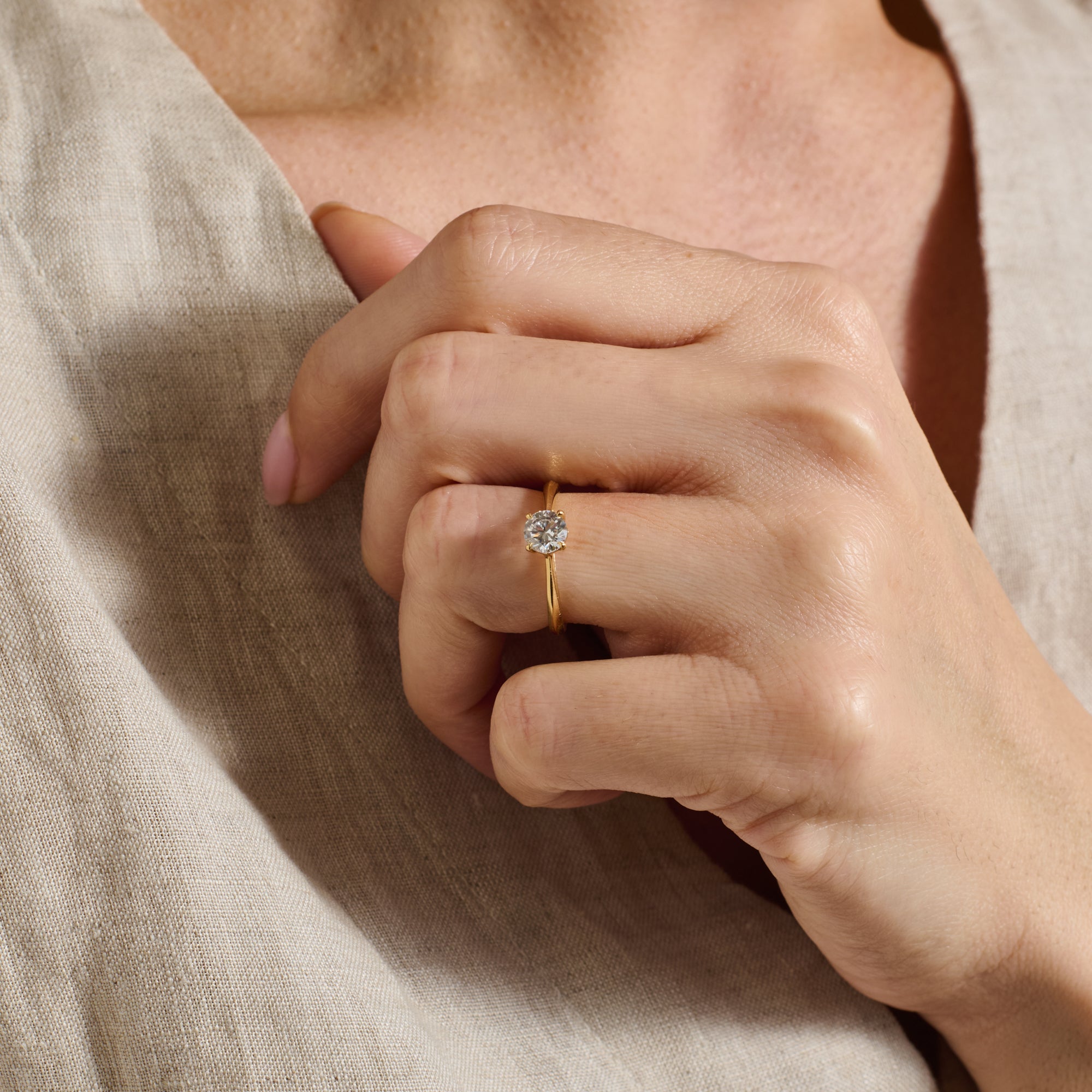 The Joy Ring - Round Cut by East London jeweller Rachel Boston | Discover our collections of unique and timeless engagement rings, wedding rings, and modern fine jewellery.