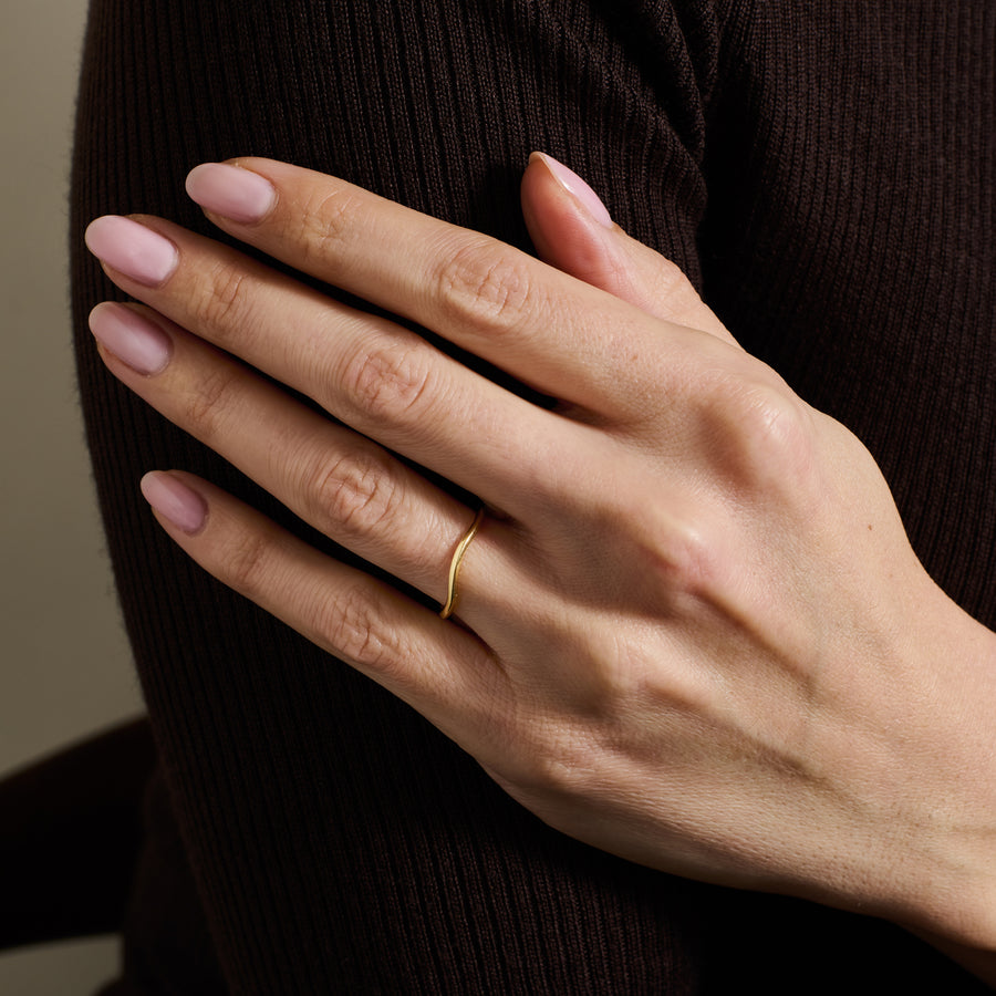 The Knife Edge Curve Band by East London jeweller Rachel Boston | Discover our collections of unique and timeless engagement rings, wedding rings, and modern fine jewellery. - Rachel Boston Jewellery