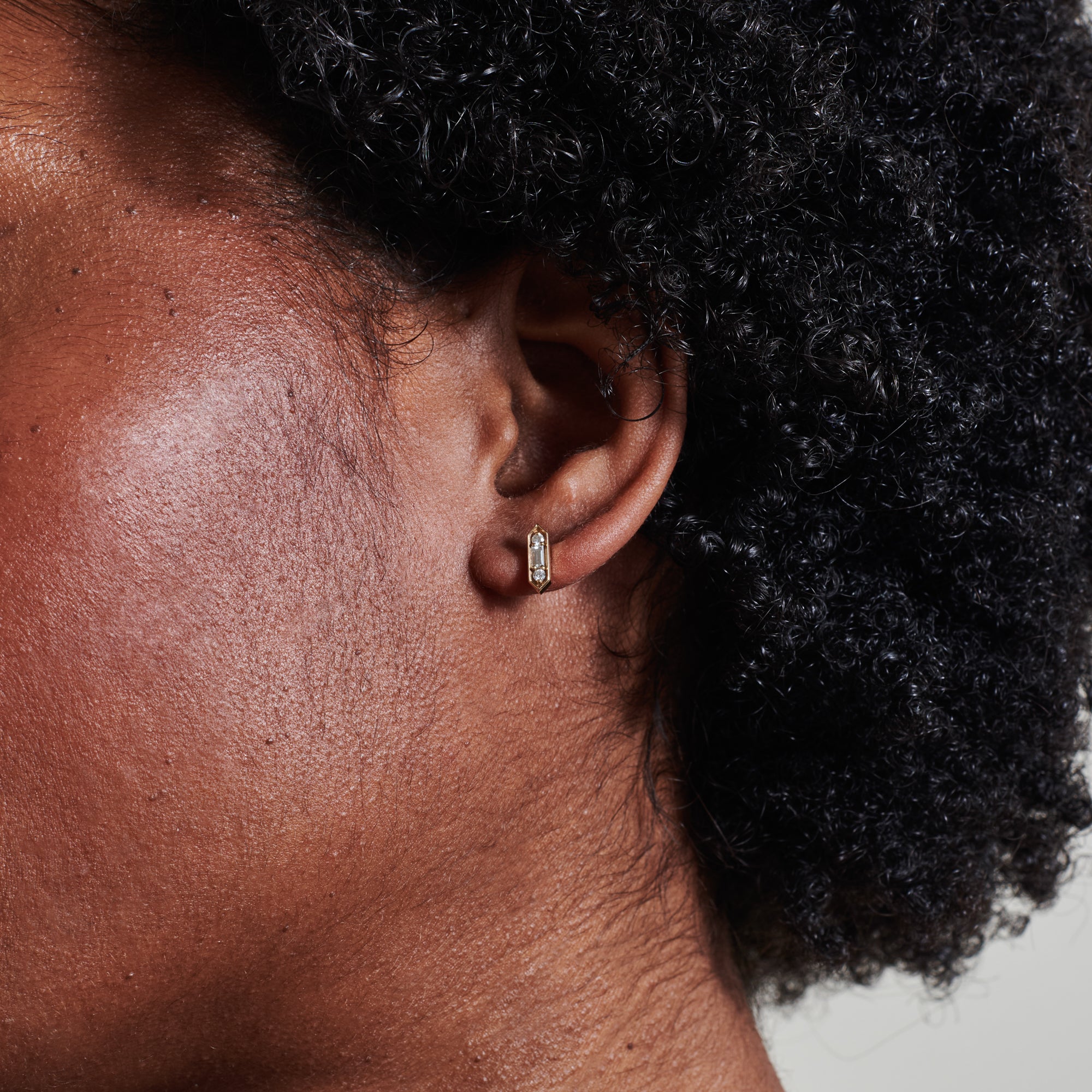The Baguette & Round Diamond Stud Earrings by East London jeweller Rachel Boston | Discover our collections of unique and timeless engagement rings, wedding rings, and modern fine jewellery.