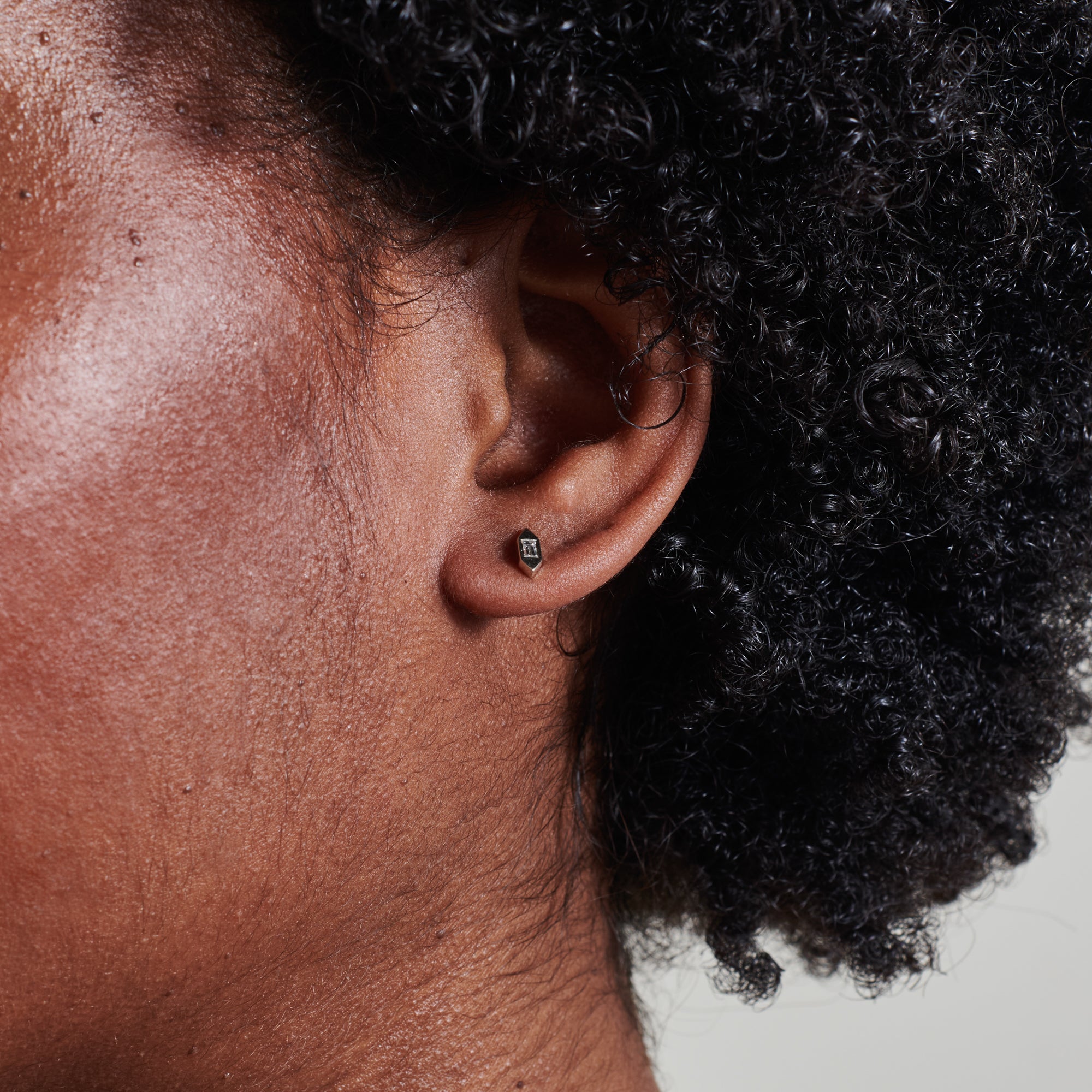 The Single Baguette Deco Earrings by East London jeweller Rachel Boston | Discover our collections of unique and timeless engagement rings, wedding rings, and modern fine jewellery.