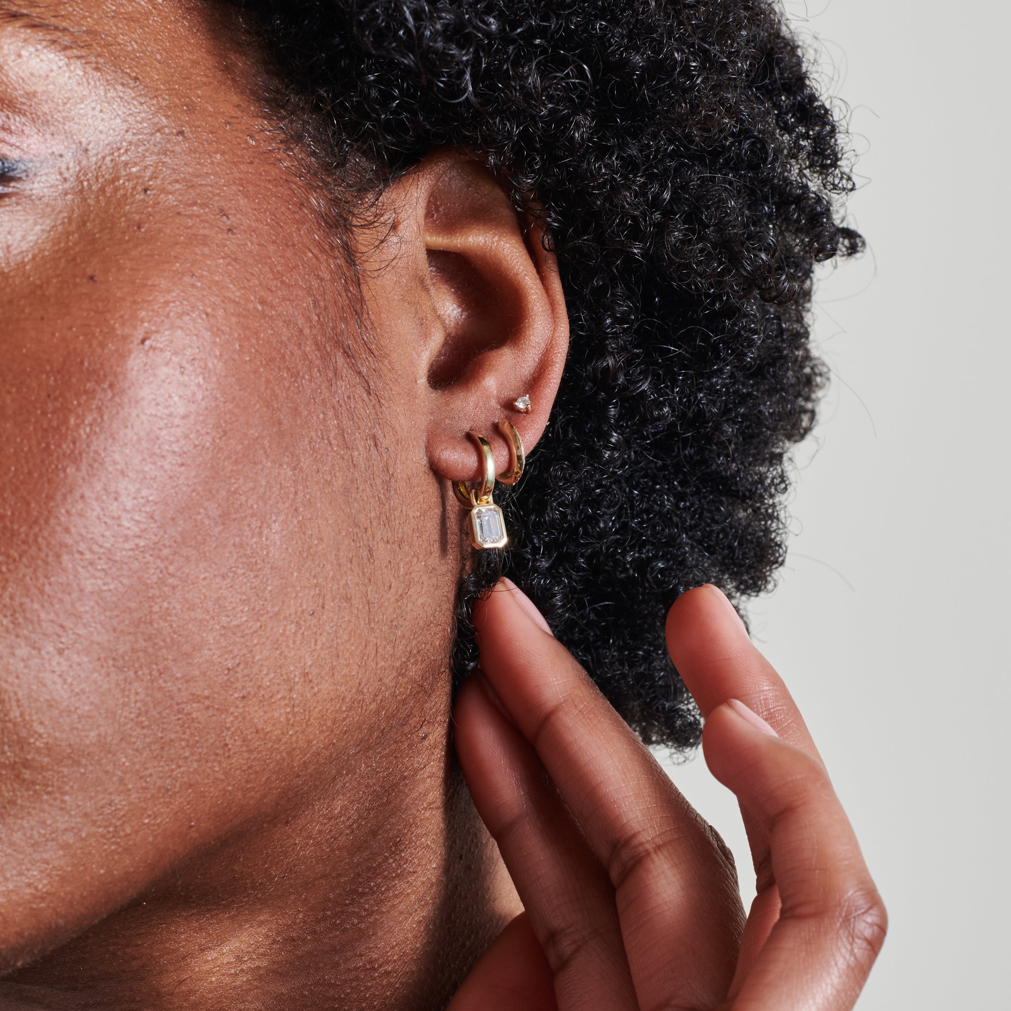 The 2mm Round Diamond Stud Earrings by East London jeweller Rachel Boston | Discover our collections of unique and timeless engagement rings, wedding rings, and modern fine jewellery.
