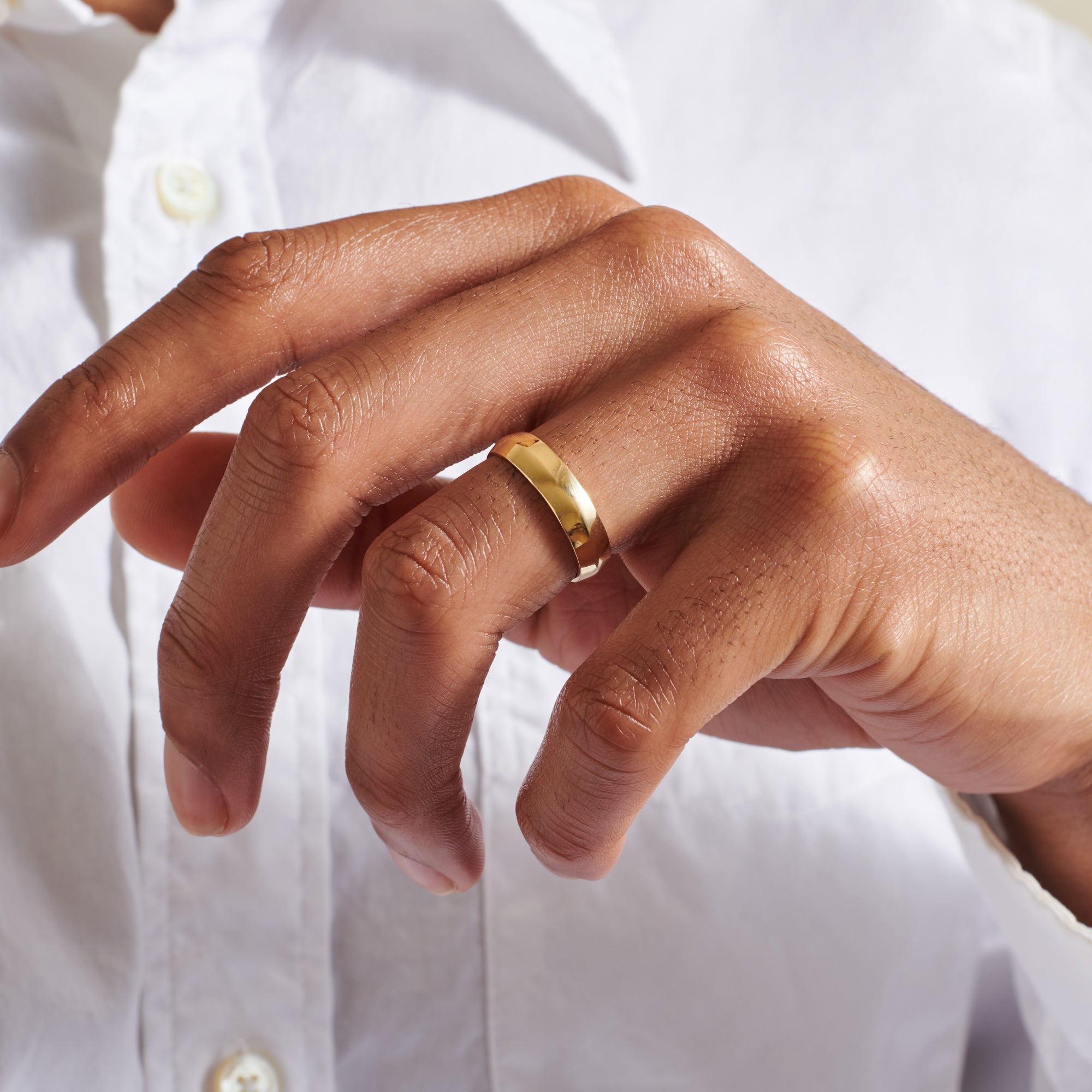 The Knife Edge Band - 5mm by East London jeweller Rachel Boston | Discover our collections of unique and timeless engagement rings, wedding rings, and modern fine jewellery.