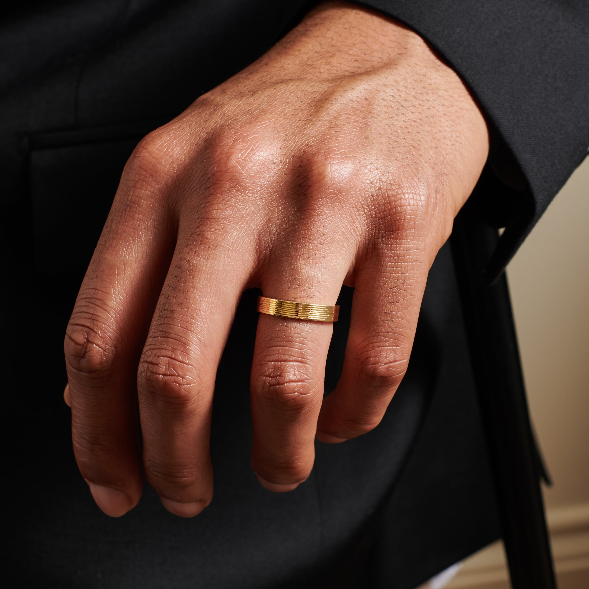 The Stream Engraved Flat Band - 4mm by East London jeweller Rachel Boston | Discover our collections of unique and timeless engagement rings, wedding rings, and modern fine jewellery.