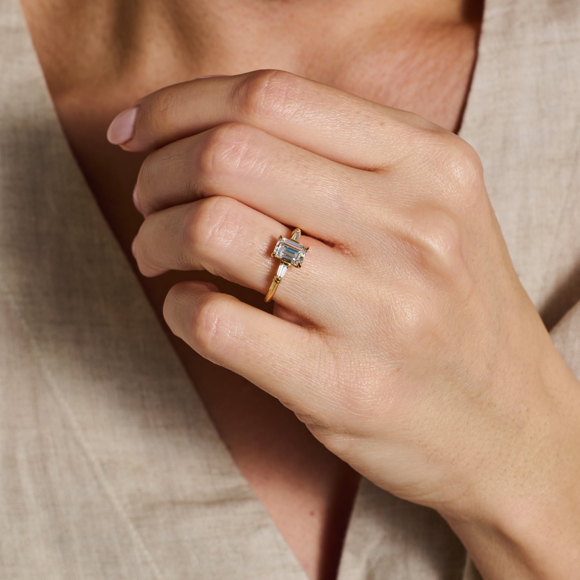The Bette Ring - Emerald Cut by East London jeweller Rachel Boston | Discover our collections of unique and timeless engagement rings, wedding rings, and modern fine jewellery.