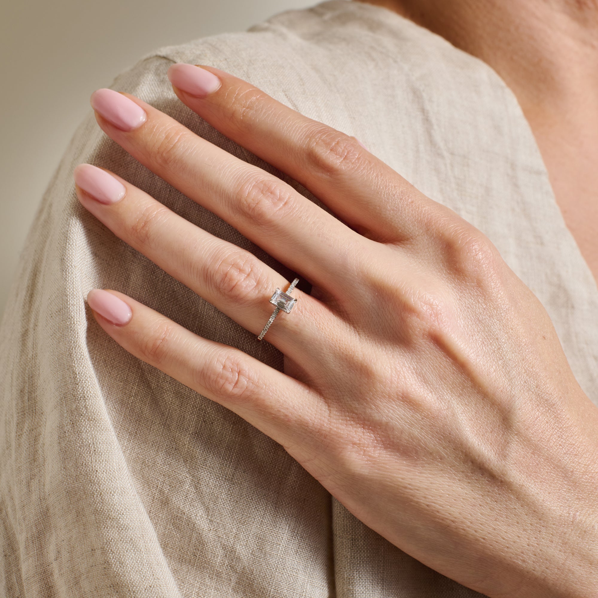 The Deco Emerald Ring by East London jeweller Rachel Boston | Discover our collections of unique and timeless engagement rings, wedding rings, and modern fine jewellery.