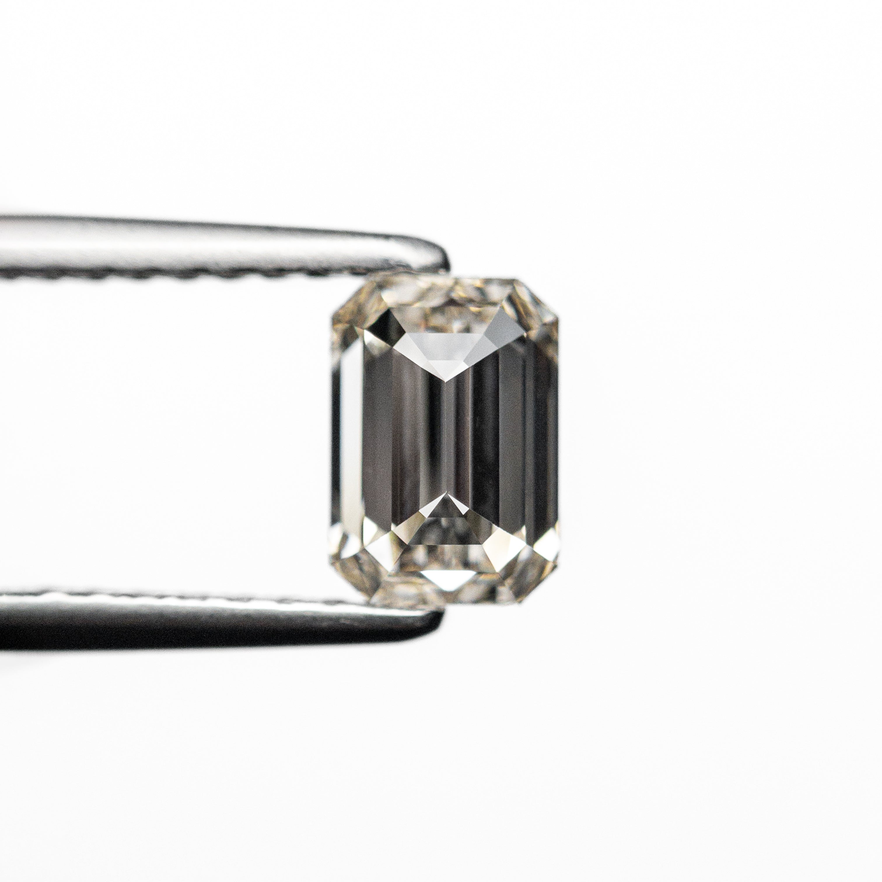The 0.91ct 6.33x4.40x3.14mm VS2 C1 Cut Corner Rectangle Step Cut 24194-02 by East London jeweller Rachel Boston | Discover our collections of unique and timeless engagement rings, wedding rings, and modern fine jewellery.