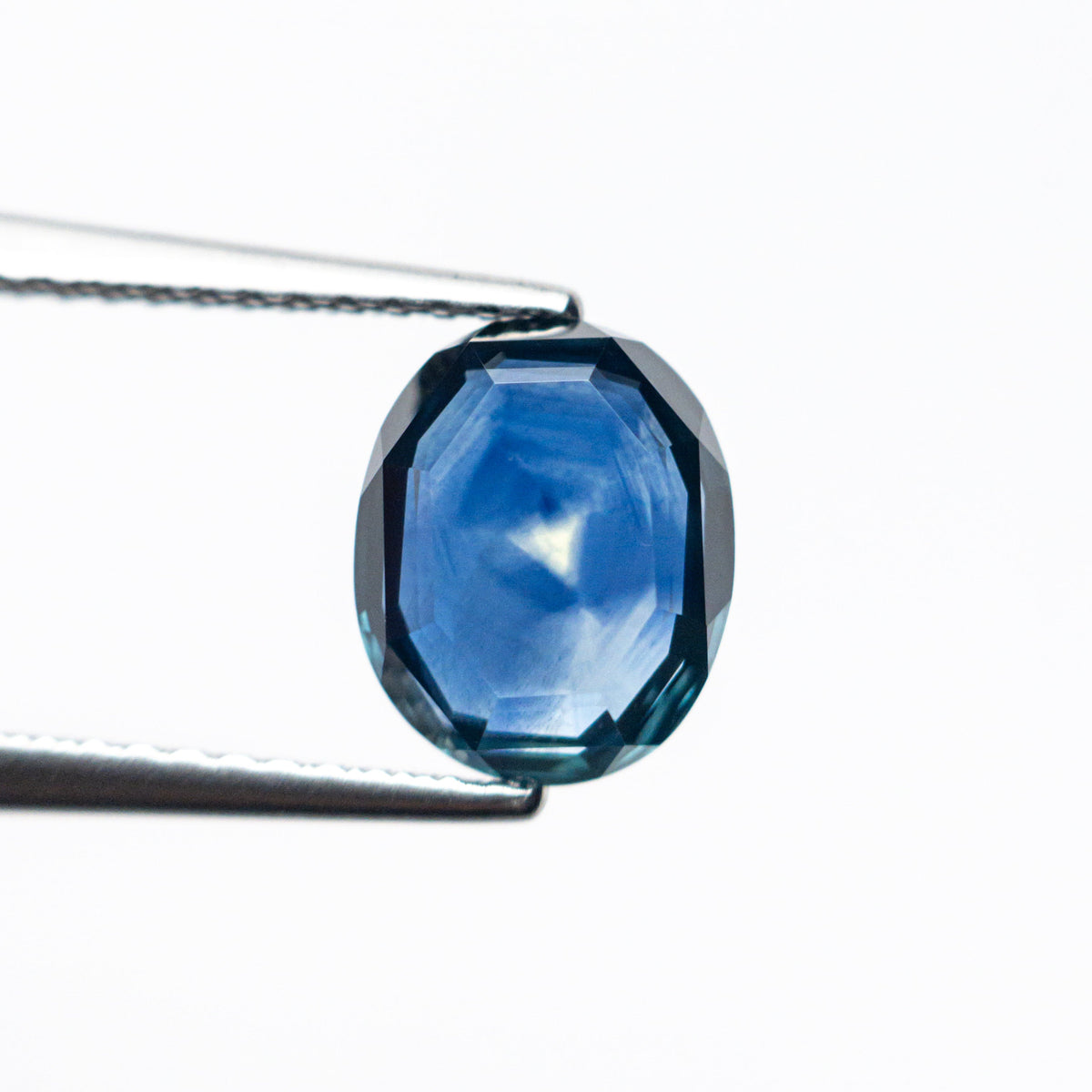 The 1.92ct 8.42x6.83x2.82mm Oval Portrait Cut Sapphire 24197-04 by East London jeweller Rachel Boston | Discover our collections of unique and timeless engagement rings, wedding rings, and modern fine jewellery.