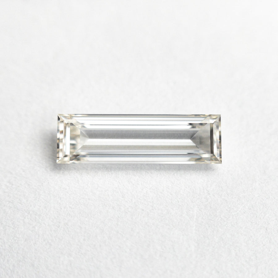 The 0.71ct 10.48x3.17x1.86mm GIA Internally Flawless I Baguette Step Cut 24302-01 by East London jeweller Rachel Boston | Discover our collections of unique and timeless engagement rings, wedding rings, and modern fine jewellery. - Rachel Boston Jewellery