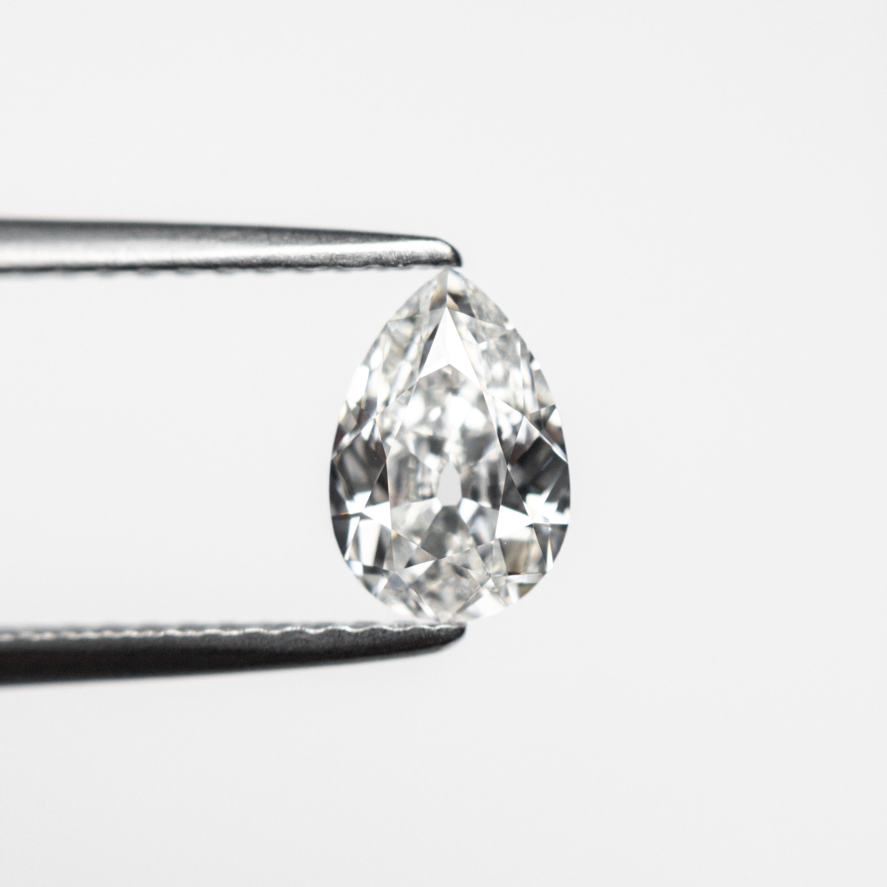 The 0.71ct 7.35x5.03x2.77mm GIA VVS1 F Pear Brilliant 24447-01 by East London jeweller Rachel Boston | Discover our collections of unique and timeless engagement rings, wedding rings, and modern fine jewellery.
