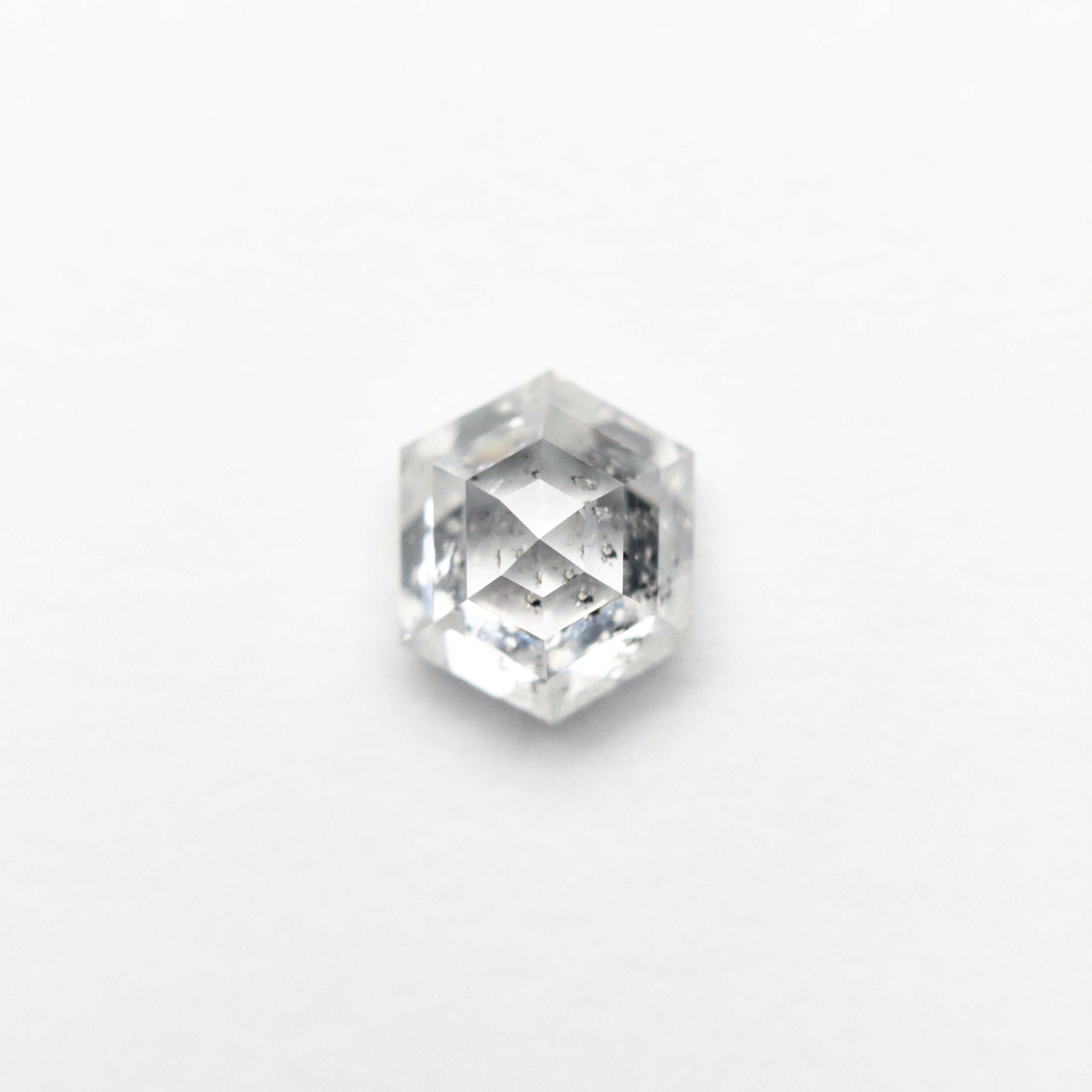 The 0.95ct 6.26x5.20x3.56mm Hexagon Step Cut 🇨🇦 24576-01 by East London jeweller Rachel Boston | Discover our collections of unique and timeless engagement rings, wedding rings, and modern fine jewellery.