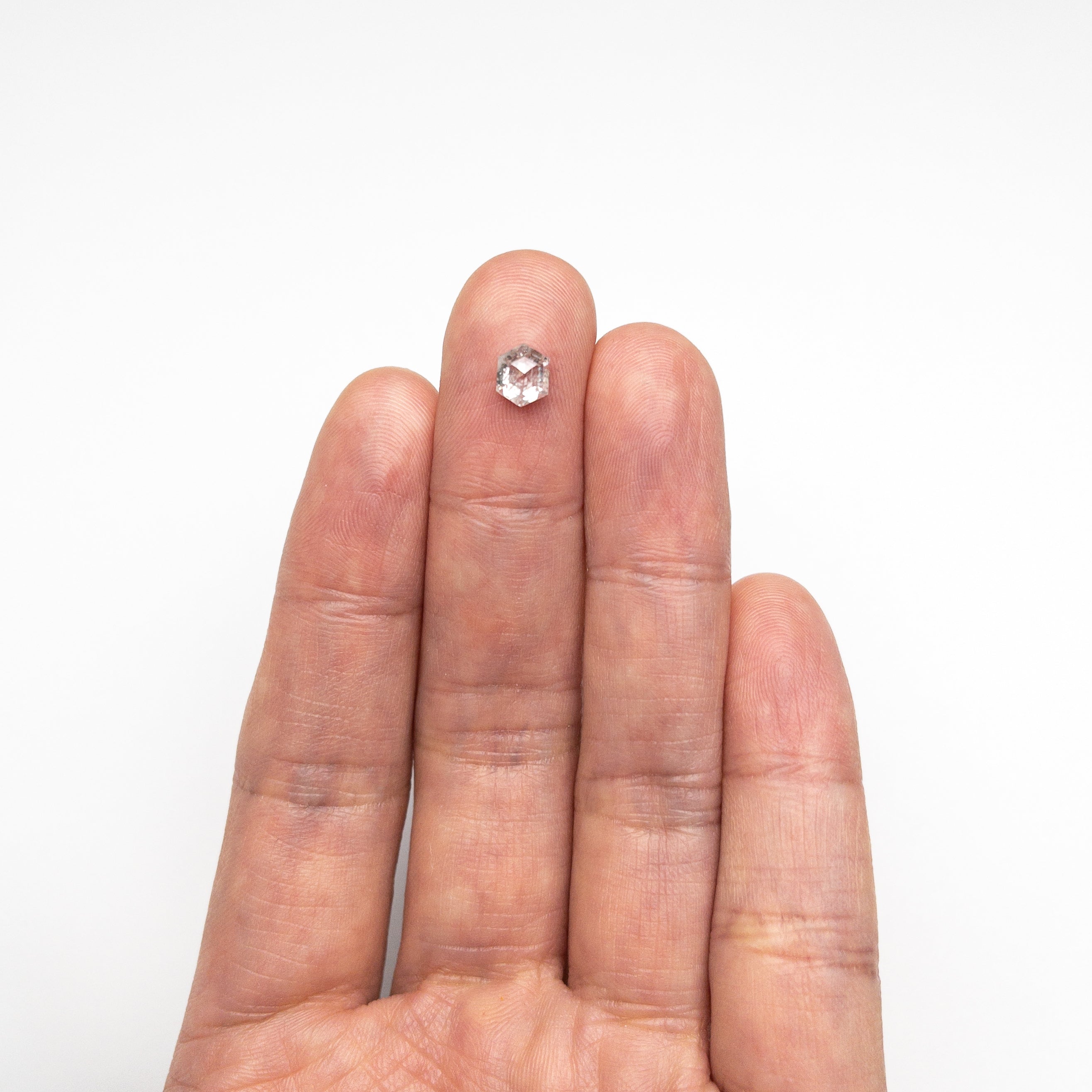 The 0.95ct 6.26x5.20x3.56mm Hexagon Step Cut 🇨🇦 24576-01 by East London jeweller Rachel Boston | Discover our collections of unique and timeless engagement rings, wedding rings, and modern fine jewellery.
