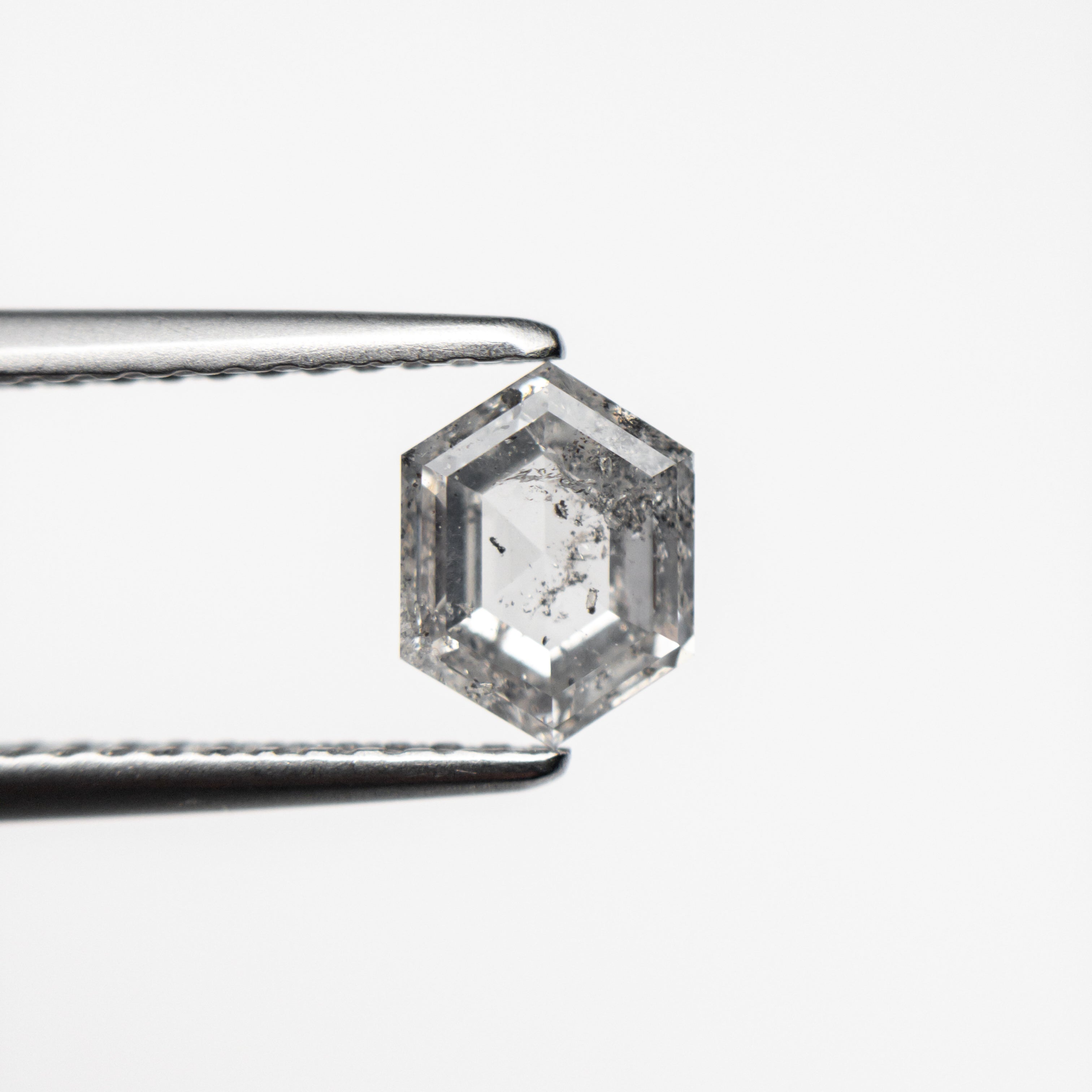 The 0.86ct 6.71x5.11x2.89mm Hexagon Step Cut 🇨🇦 24588-01 by East London jeweller Rachel Boston | Discover our collections of unique and timeless engagement rings, wedding rings, and modern fine jewellery.