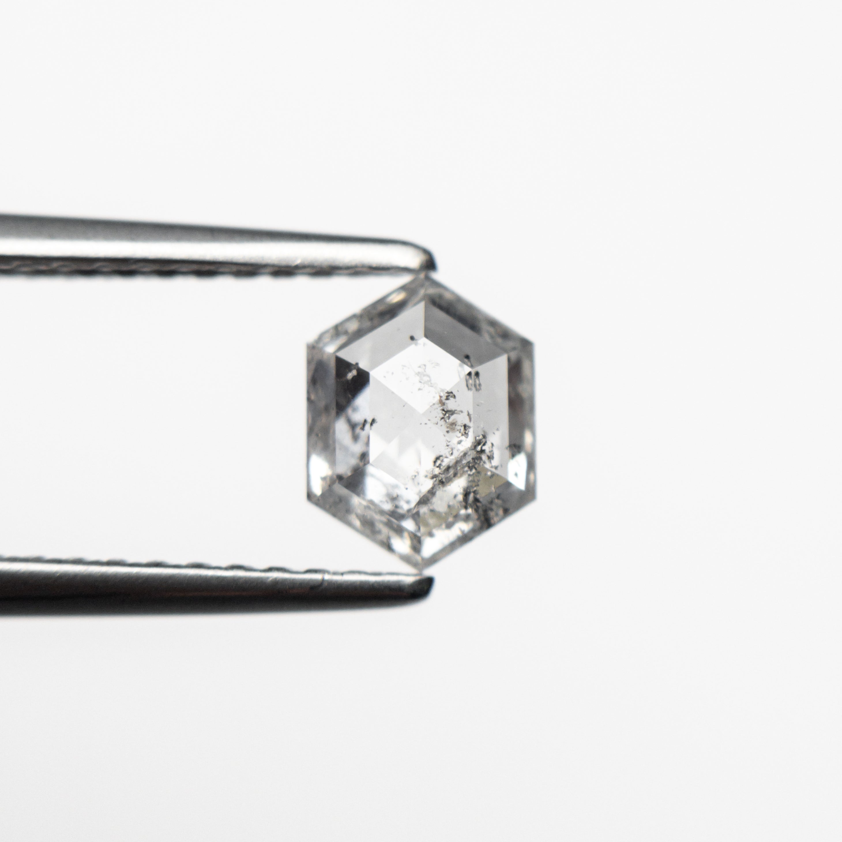 The 0.86ct 6.71x5.11x2.89mm Hexagon Step Cut 🇨🇦 24588-01 by East London jeweller Rachel Boston | Discover our collections of unique and timeless engagement rings, wedding rings, and modern fine jewellery.