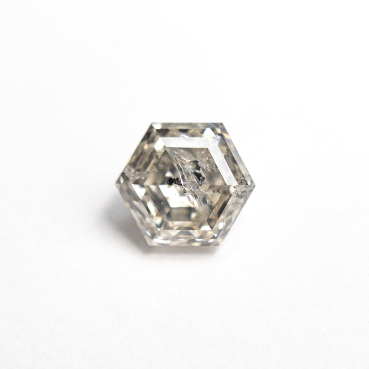 The 1.40ct 7.01x5.98x4.32mm Hexagon Step Cut 🇨🇦 24605-01 by East London jeweller Rachel Boston | Discover our collections of unique and timeless engagement rings, wedding rings, and modern fine jewellery.
