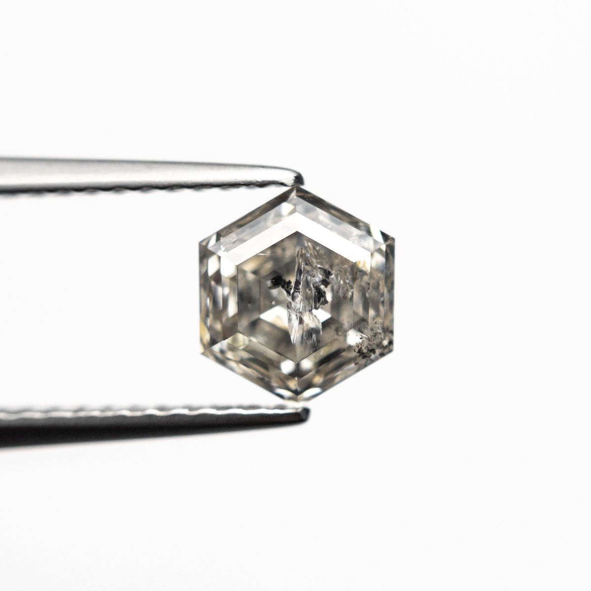 The 1.40ct 7.01x5.98x4.32mm Hexagon Step Cut 🇨🇦 24605-01 by East London jeweller Rachel Boston | Discover our collections of unique and timeless engagement rings, wedding rings, and modern fine jewellery.