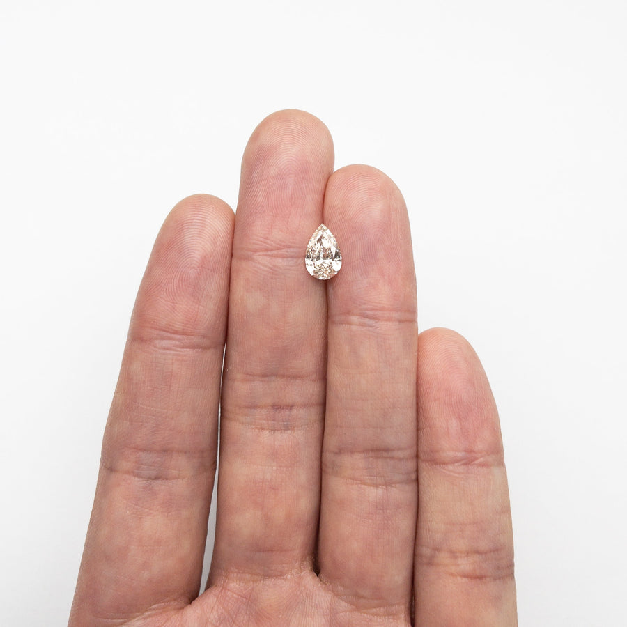 The 1.20ct 9.15x5.89x3.56mm GIA VS2 L Pear Brilliant 🇨🇦 24685-01 by East London jeweller Rachel Boston | Discover our collections of unique and timeless engagement rings, wedding rings, and modern fine jewellery. - Rachel Boston Jewellery