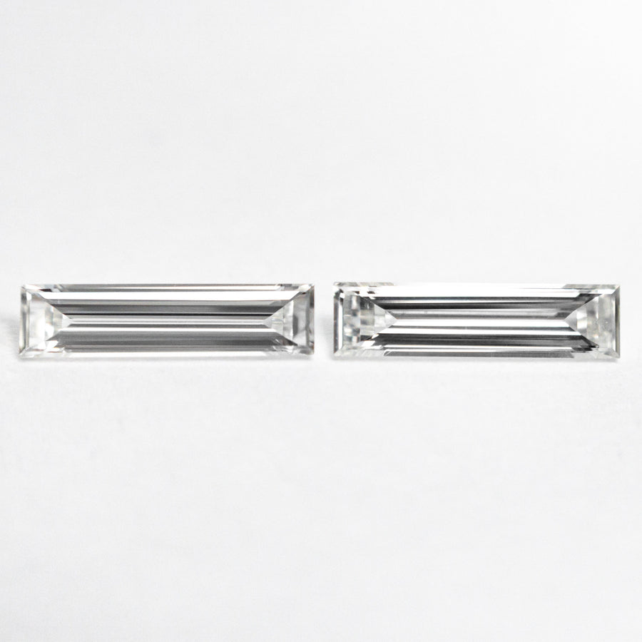 The 0.43cttw 2pc 8.07x1.98x1.22mm 8.07x2.05x1.29mm VS G Baguette Step Cut Matching Pair 24701-01 by East London jeweller Rachel Boston | Discover our collections of unique and timeless engagement rings, wedding rings, and modern fine jewellery. - Rachel Boston Jewellery