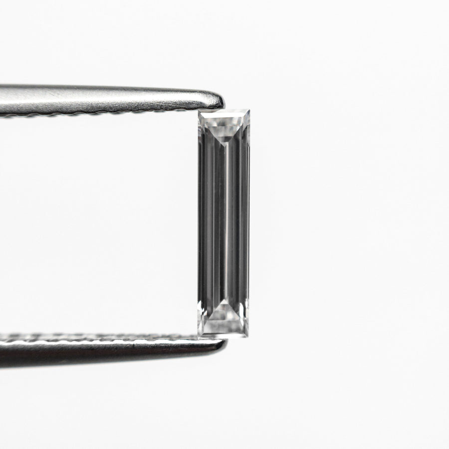The 0.25ct 9.05x2.06x1.24mm VS1 E Baguette Step Cut 24701-07 by East London jeweller Rachel Boston | Discover our collections of unique and timeless engagement rings, wedding rings, and modern fine jewellery. - Rachel Boston Jewellery