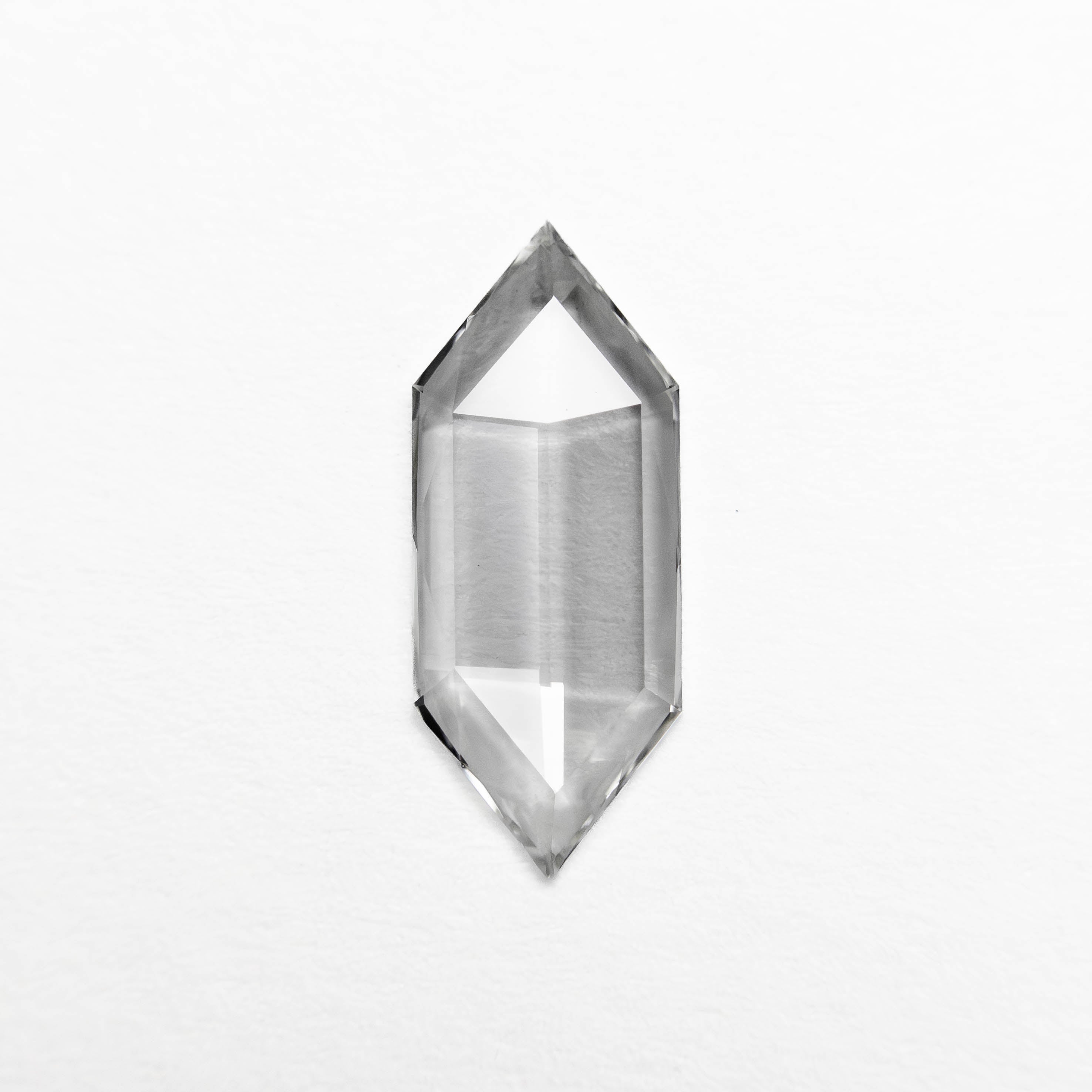 The 0.37ct 9.90x4.00x1.01mm Hexagon Rosecut 24859-01 by East London jeweller Rachel Boston | Discover our collections of unique and timeless engagement rings, wedding rings, and modern fine jewellery.
