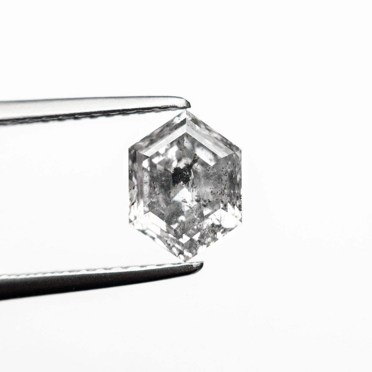 The 1.29ct 7.87x5.81x3.86mm Hexagon Step Cut 🇨🇦 24874-01 by East London jeweller Rachel Boston | Discover our collections of unique and timeless engagement rings, wedding rings, and modern fine jewellery.