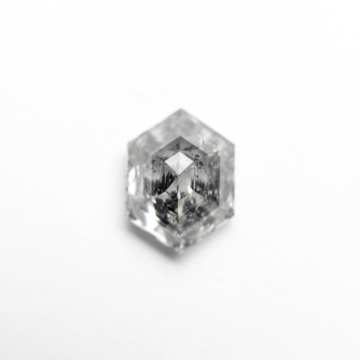 The 1.29ct 7.87x5.81x3.86mm Hexagon Step Cut 🇨🇦 24874-01 by East London jeweller Rachel Boston | Discover our collections of unique and timeless engagement rings, wedding rings, and modern fine jewellery.