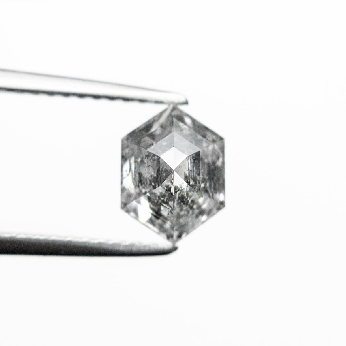 The 1.29ct 7.87x5.81x3.86mm Hexagon Step Cut 🇨🇦 24874-01 by East London jeweller Rachel Boston | Discover our collections of unique and timeless engagement rings, wedding rings, and modern fine jewellery.