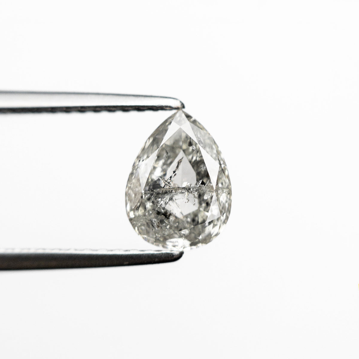 The 1.20ct 7.79x5.85x3.14mm Pear Double Cut 🇨🇦 24892-01 by East London jeweller Rachel Boston | Discover our collections of unique and timeless engagement rings, wedding rings, and modern fine jewellery.