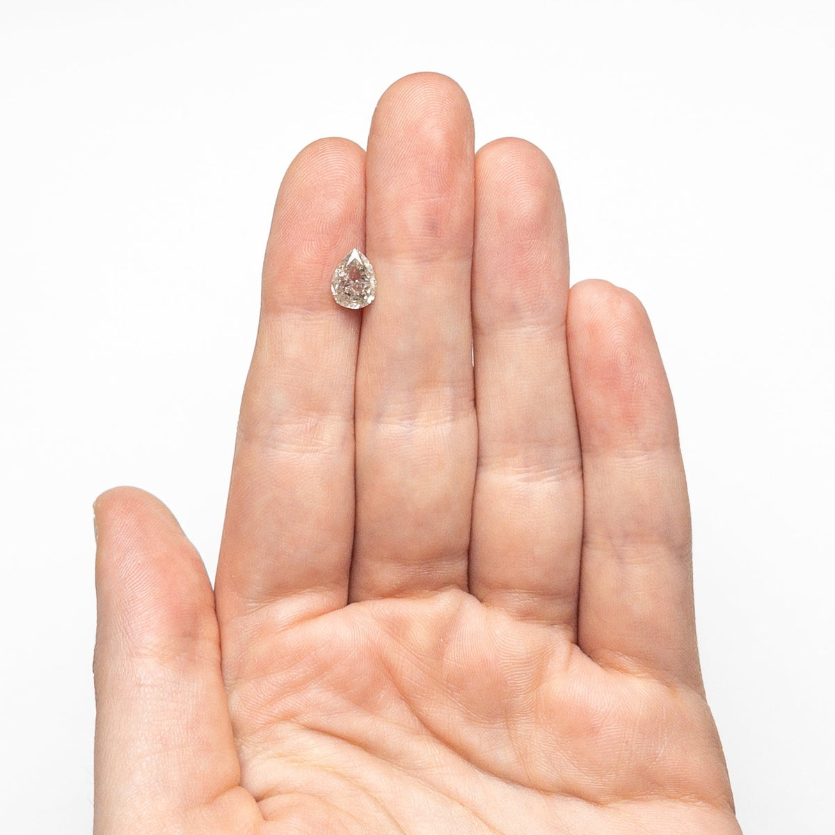 The 1.20ct 7.79x5.85x3.14mm Pear Double Cut 🇨🇦 24892-01 by East London jeweller Rachel Boston | Discover our collections of unique and timeless engagement rings, wedding rings, and modern fine jewellery.
