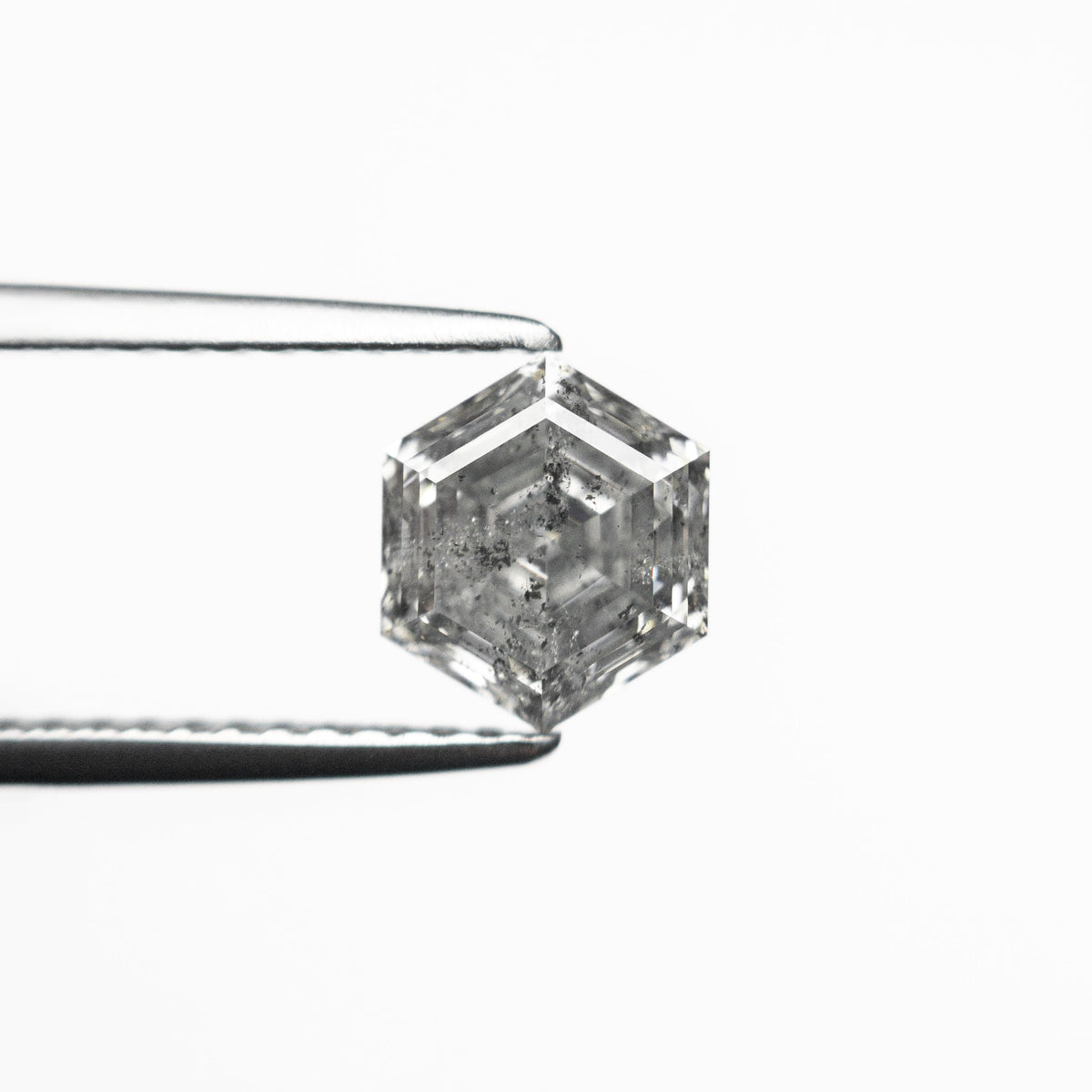 The 1.23ct 6.95x5.93x3.99mm Hexagon Step Cut 🇨🇦 24911-01 by East London jeweller Rachel Boston | Discover our collections of unique and timeless engagement rings, wedding rings, and modern fine jewellery.