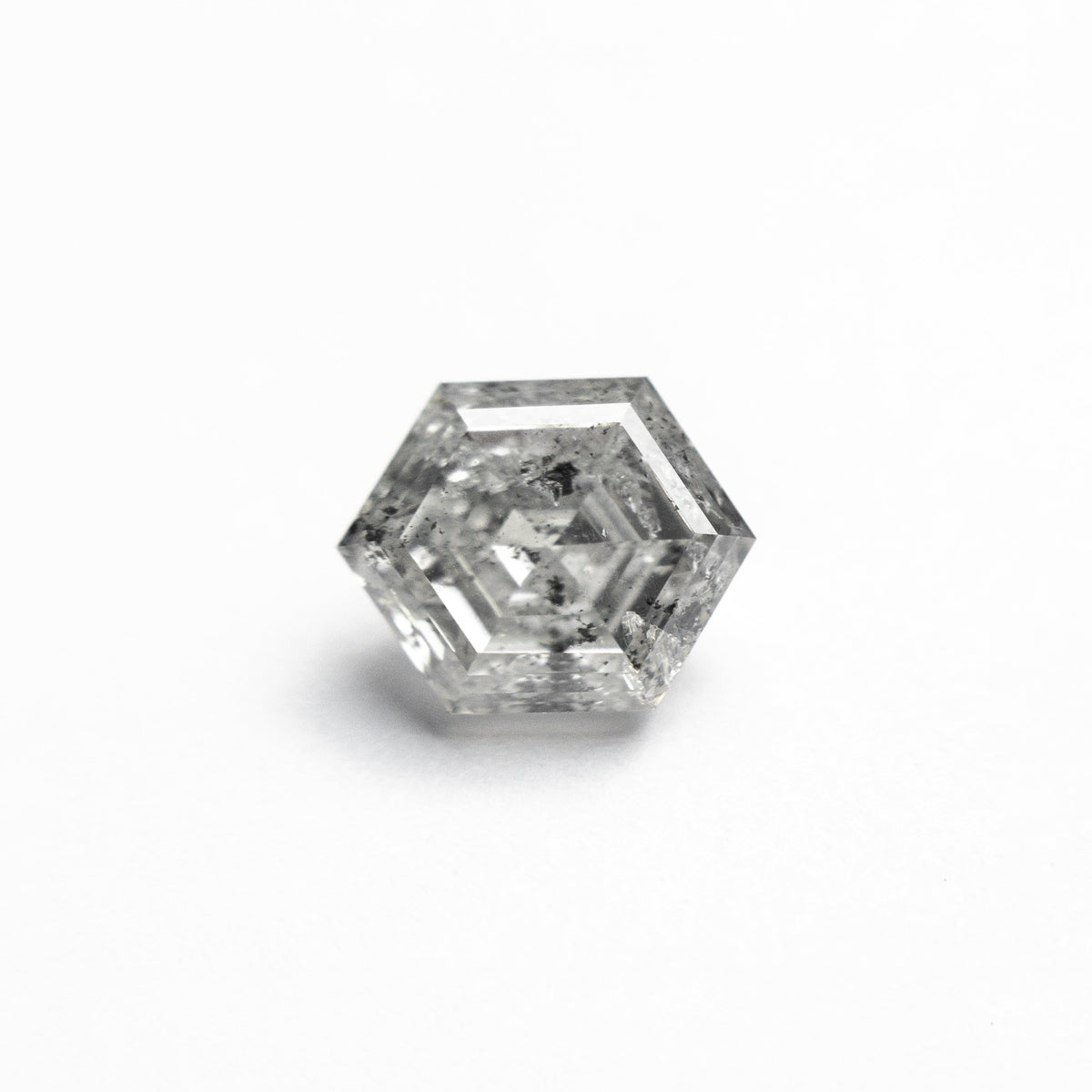 The 1.37ct 7.60x6.11x3.93mm Hexagon Step Cut 🇨🇦 24959-01 by East London jeweller Rachel Boston | Discover our collections of unique and timeless engagement rings, wedding rings, and modern fine jewellery.