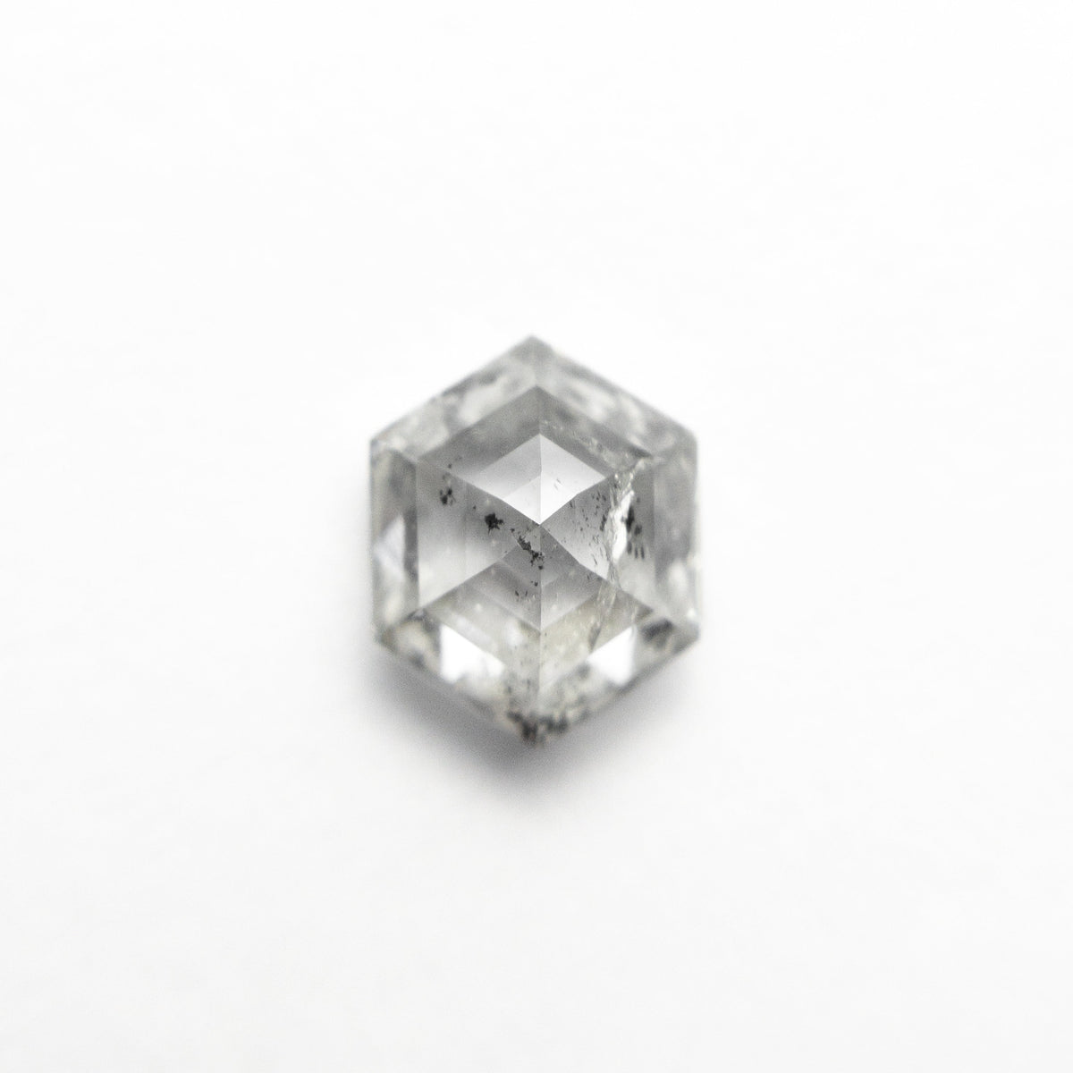 The 1.37ct 7.60x6.11x3.93mm Hexagon Step Cut 🇨🇦 24959-01 by East London jeweller Rachel Boston | Discover our collections of unique and timeless engagement rings, wedding rings, and modern fine jewellery.