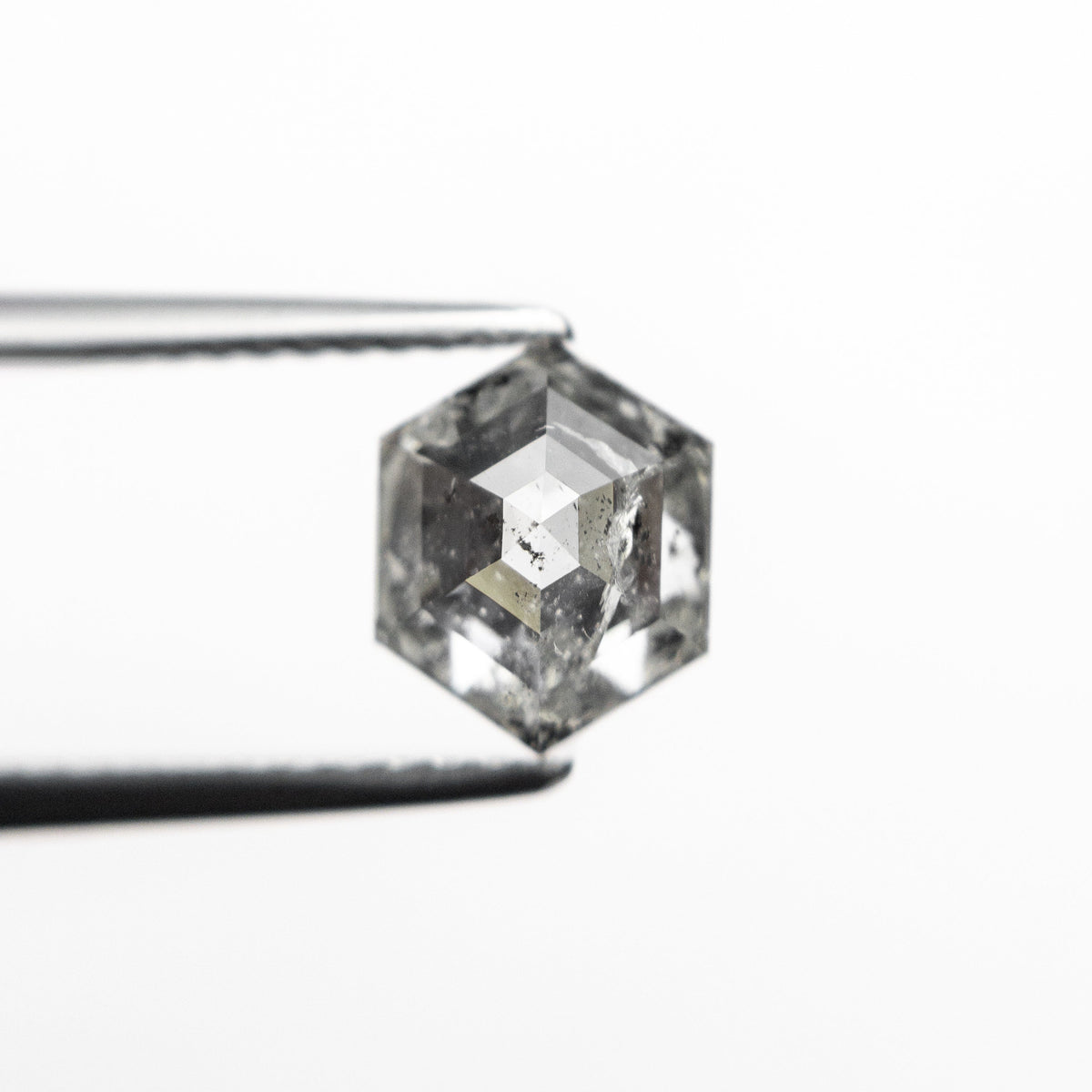 The 1.37ct 7.60x6.11x3.93mm Hexagon Step Cut 🇨🇦 24959-01 by East London jeweller Rachel Boston | Discover our collections of unique and timeless engagement rings, wedding rings, and modern fine jewellery.