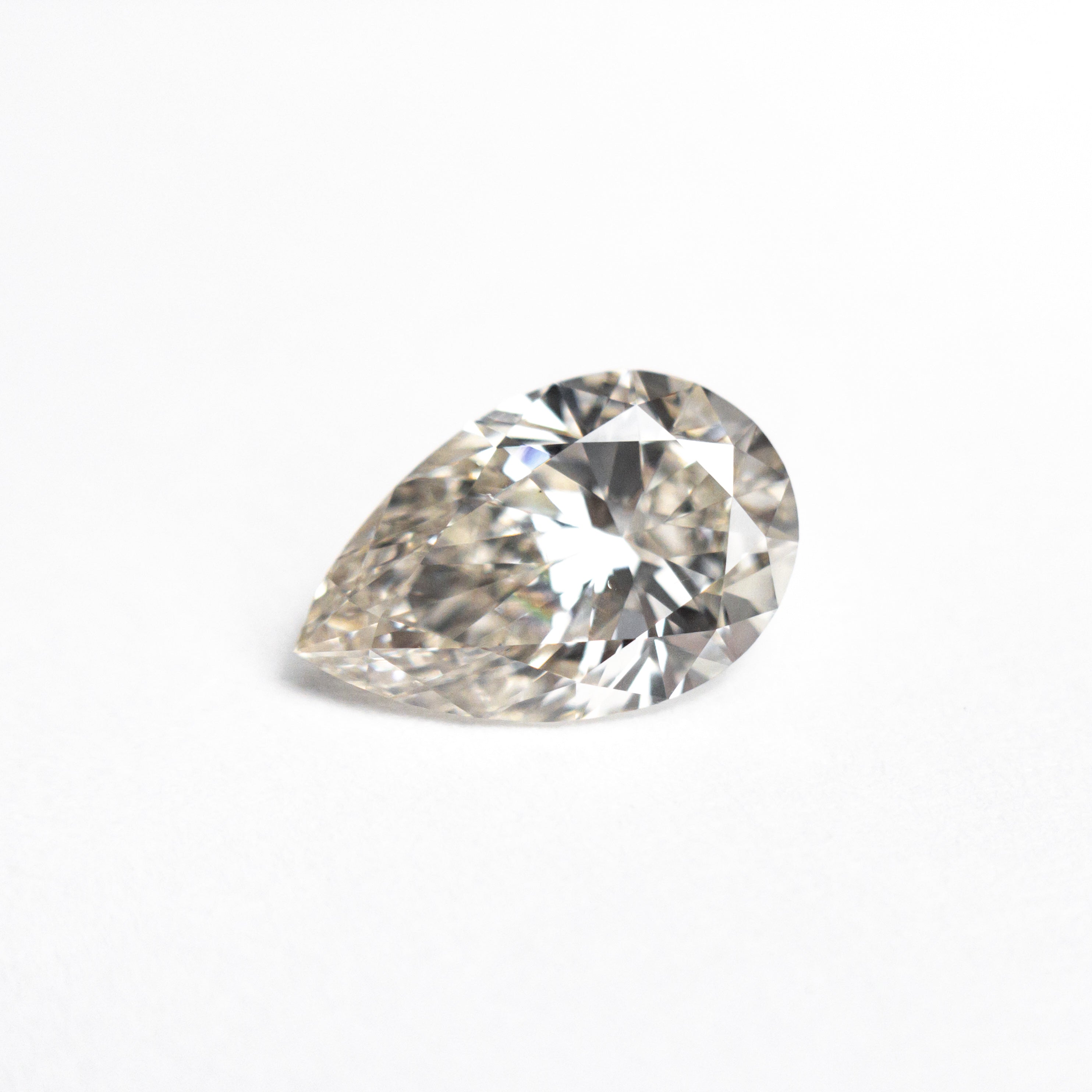 The 1.01ct 8.76x5.60x3.40mm SI1 C1 Pear Brilliant 🇨🇦 25025-01 by East London jeweller Rachel Boston | Discover our collections of unique and timeless engagement rings, wedding rings, and modern fine jewellery.