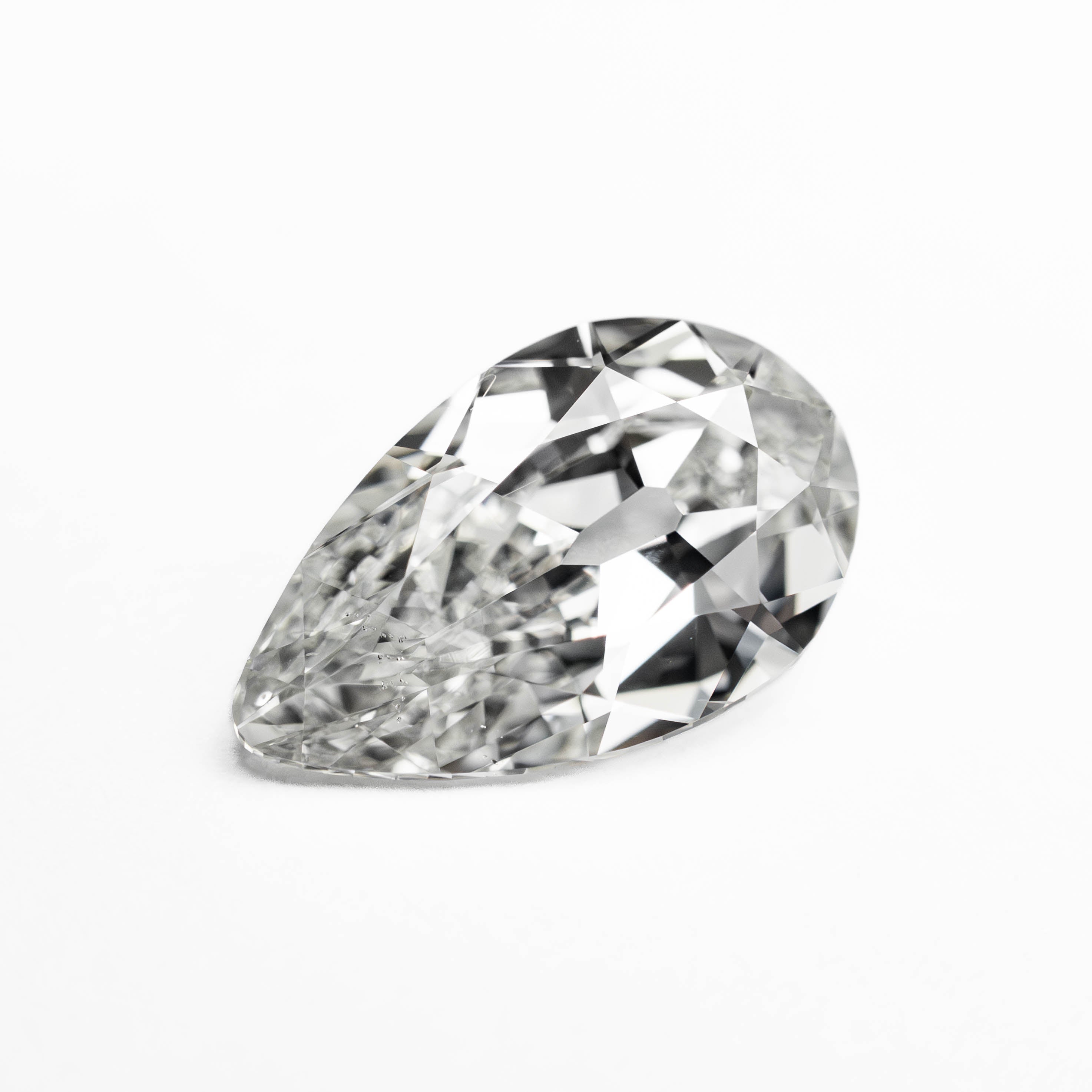 The 1.51ct 10.26x6.26x3.45mm GIA SI1 G Modern Antique Pear Brilliant 25085-01 by East London jeweller Rachel Boston | Discover our collections of unique and timeless engagement rings, wedding rings, and modern fine jewellery.