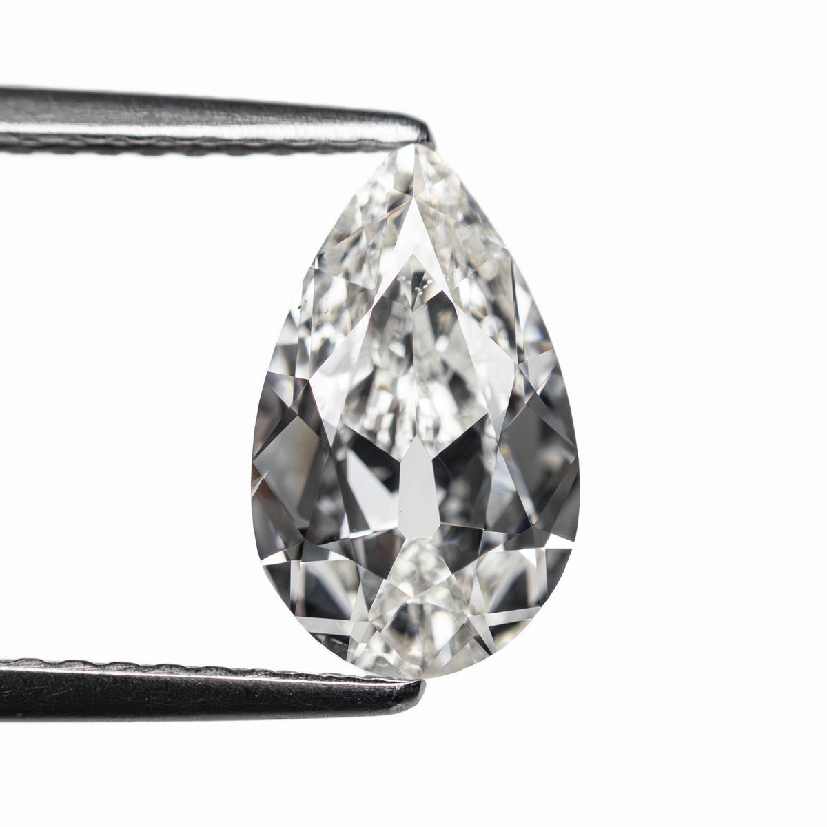 The 1.51ct 10.26x6.26x3.45mm GIA SI1 G Modern Antique Pear Brilliant 25085-01 by East London jeweller Rachel Boston | Discover our collections of unique and timeless engagement rings, wedding rings, and modern fine jewellery.