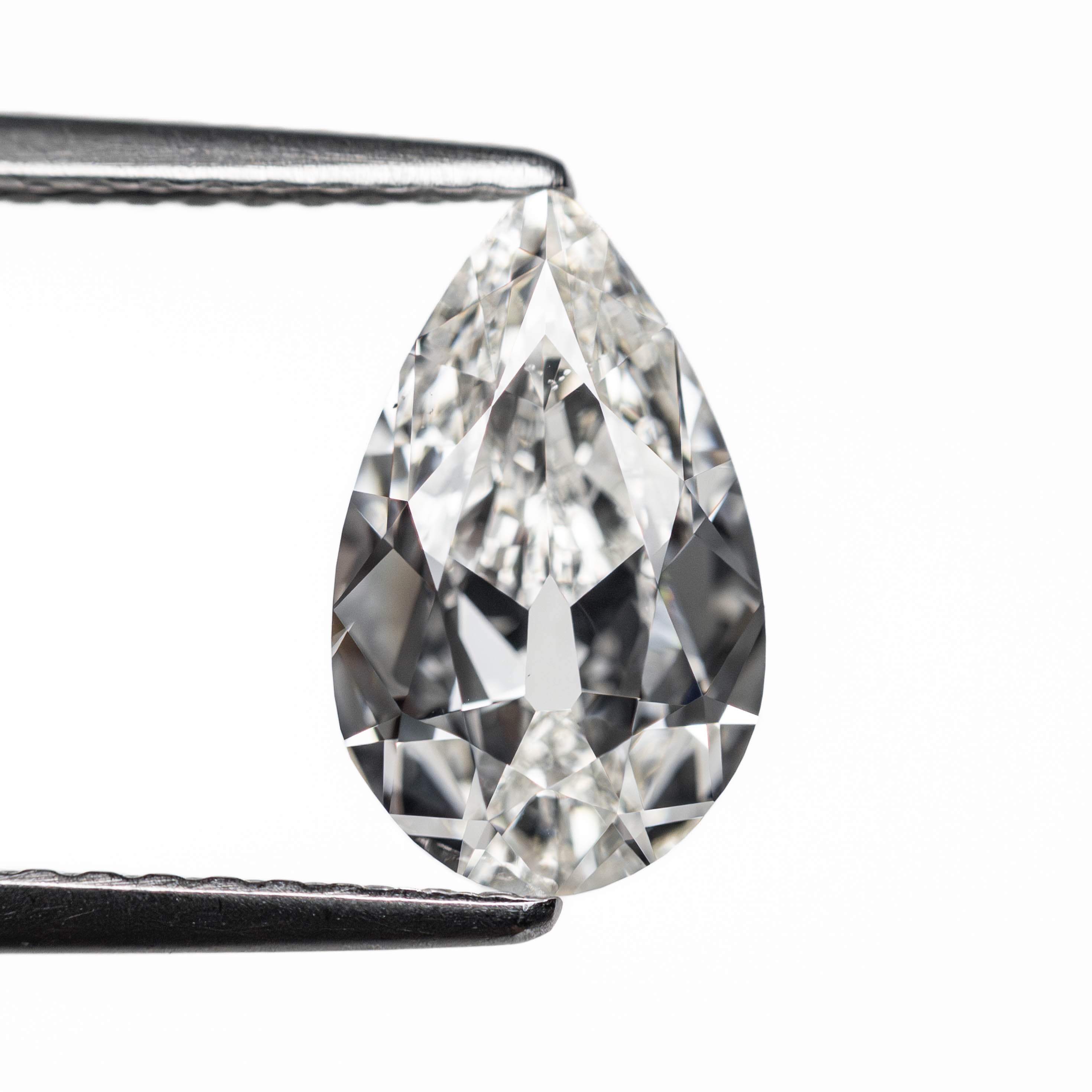 The 1.51ct 10.26x6.26x3.45mm GIA SI1 G Modern Antique Pear Brilliant 25085-01 by East London jeweller Rachel Boston | Discover our collections of unique and timeless engagement rings, wedding rings, and modern fine jewellery.