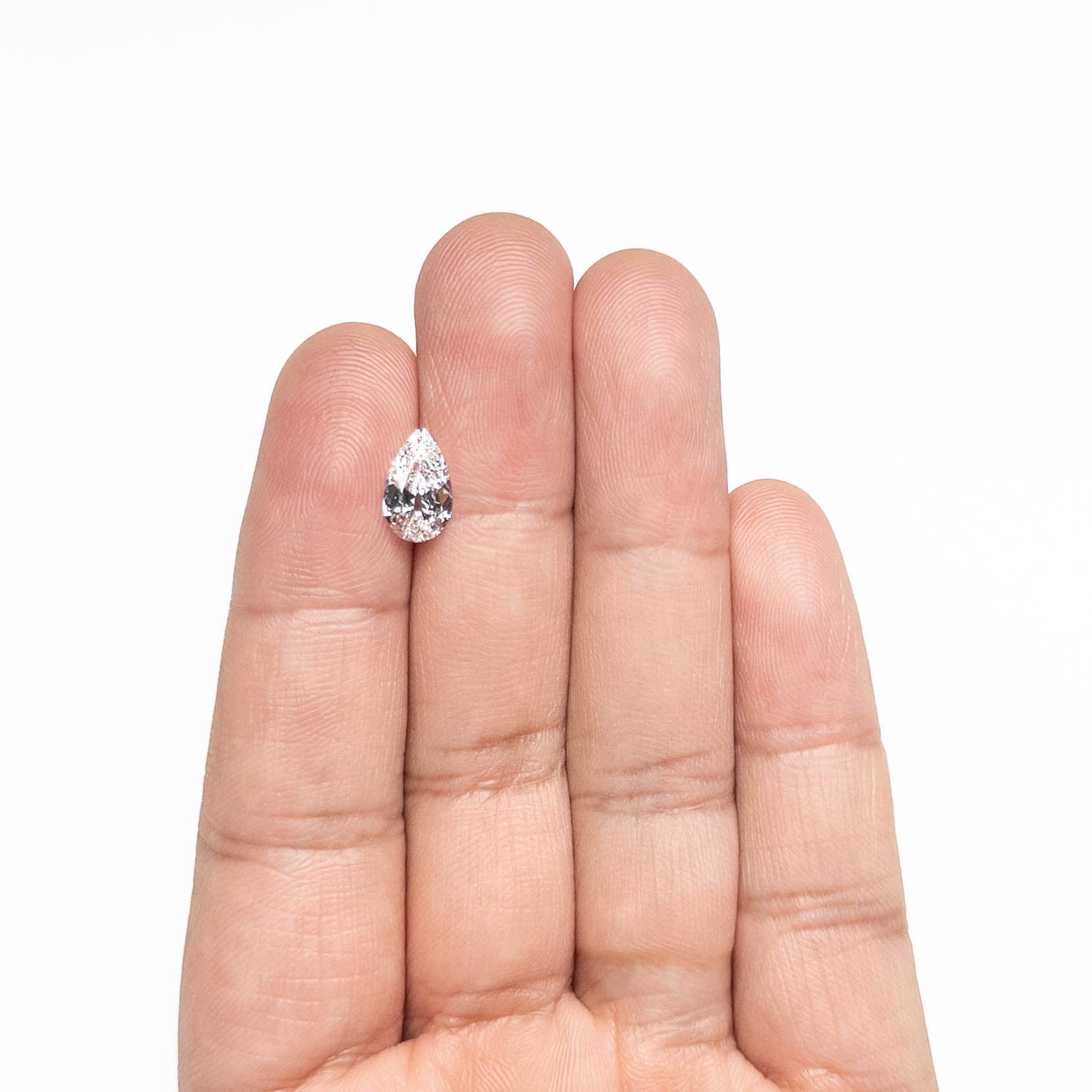The 1.51ct 10.26x6.26x3.45mm GIA SI1 G Modern Antique Pear Brilliant 25085-01 by East London jeweller Rachel Boston | Discover our collections of unique and timeless engagement rings, wedding rings, and modern fine jewellery.