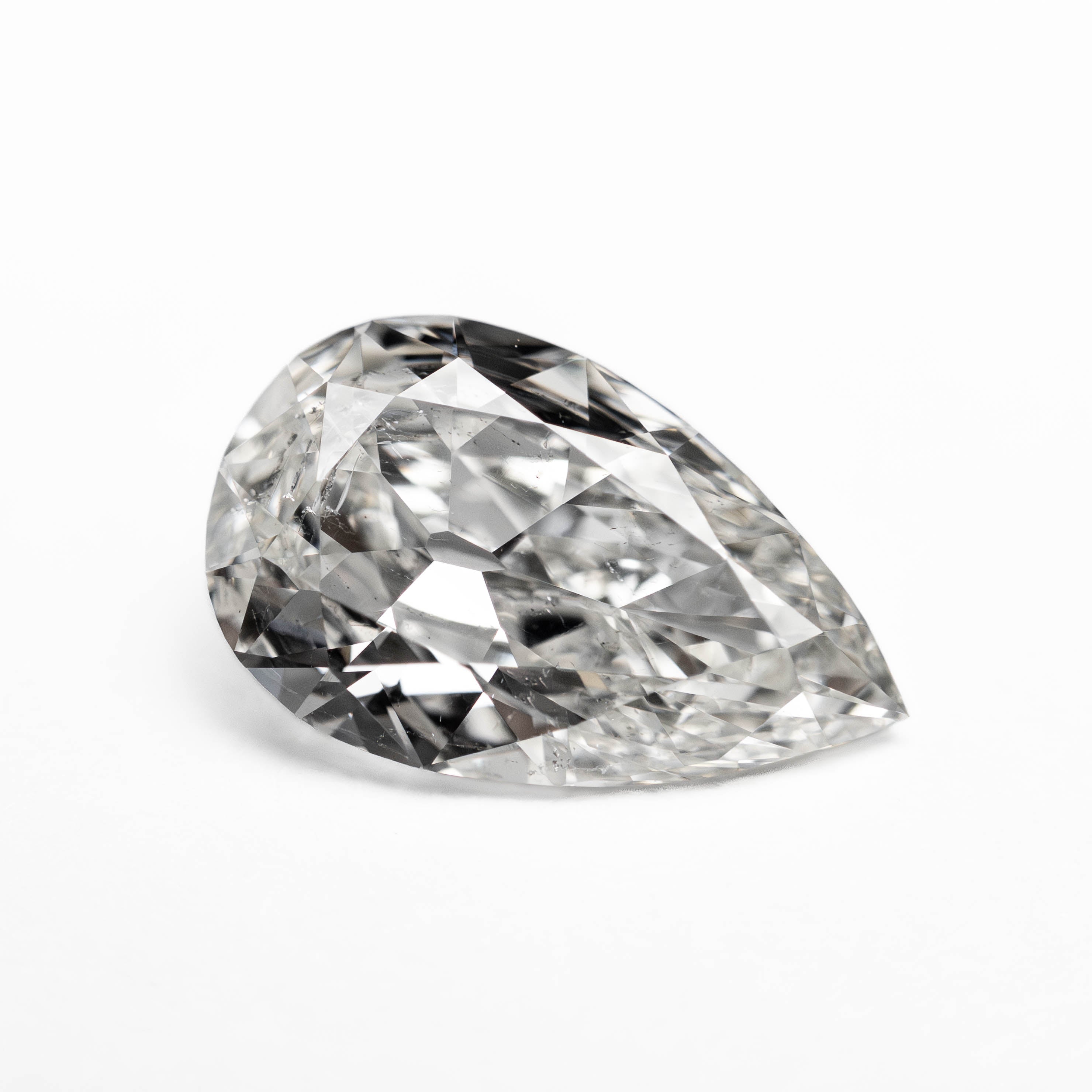 The 1.51ct 10.68x6.68x3.24mm GIA SI2 G Modern Antique Pear Brilliant 25086-01 by East London jeweller Rachel Boston | Discover our collections of unique and timeless engagement rings, wedding rings, and modern fine jewellery.
