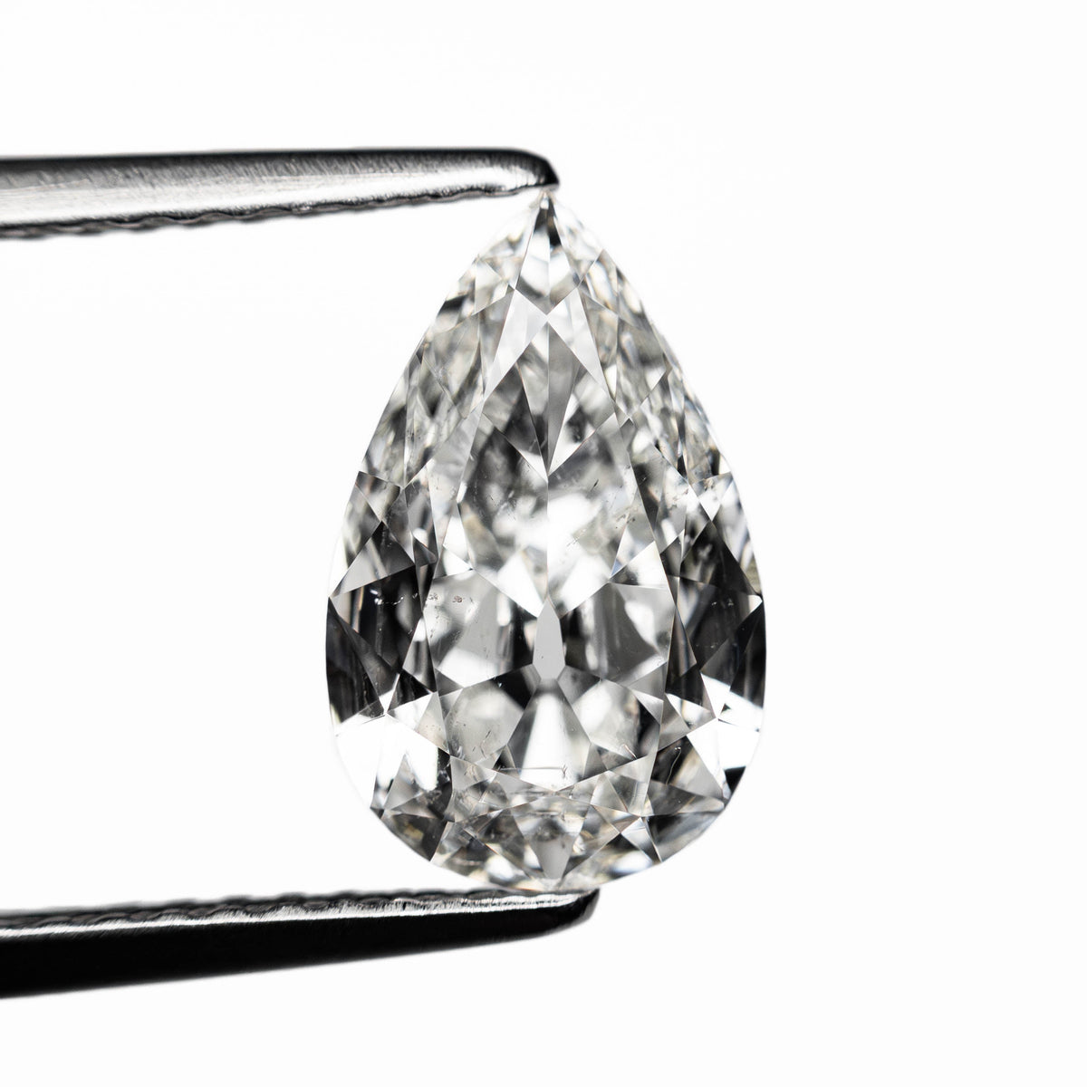 The 1.51ct 10.68x6.68x3.24mm GIA SI2 G Modern Antique Pear Brilliant 25086-01 by East London jeweller Rachel Boston | Discover our collections of unique and timeless engagement rings, wedding rings, and modern fine jewellery.
