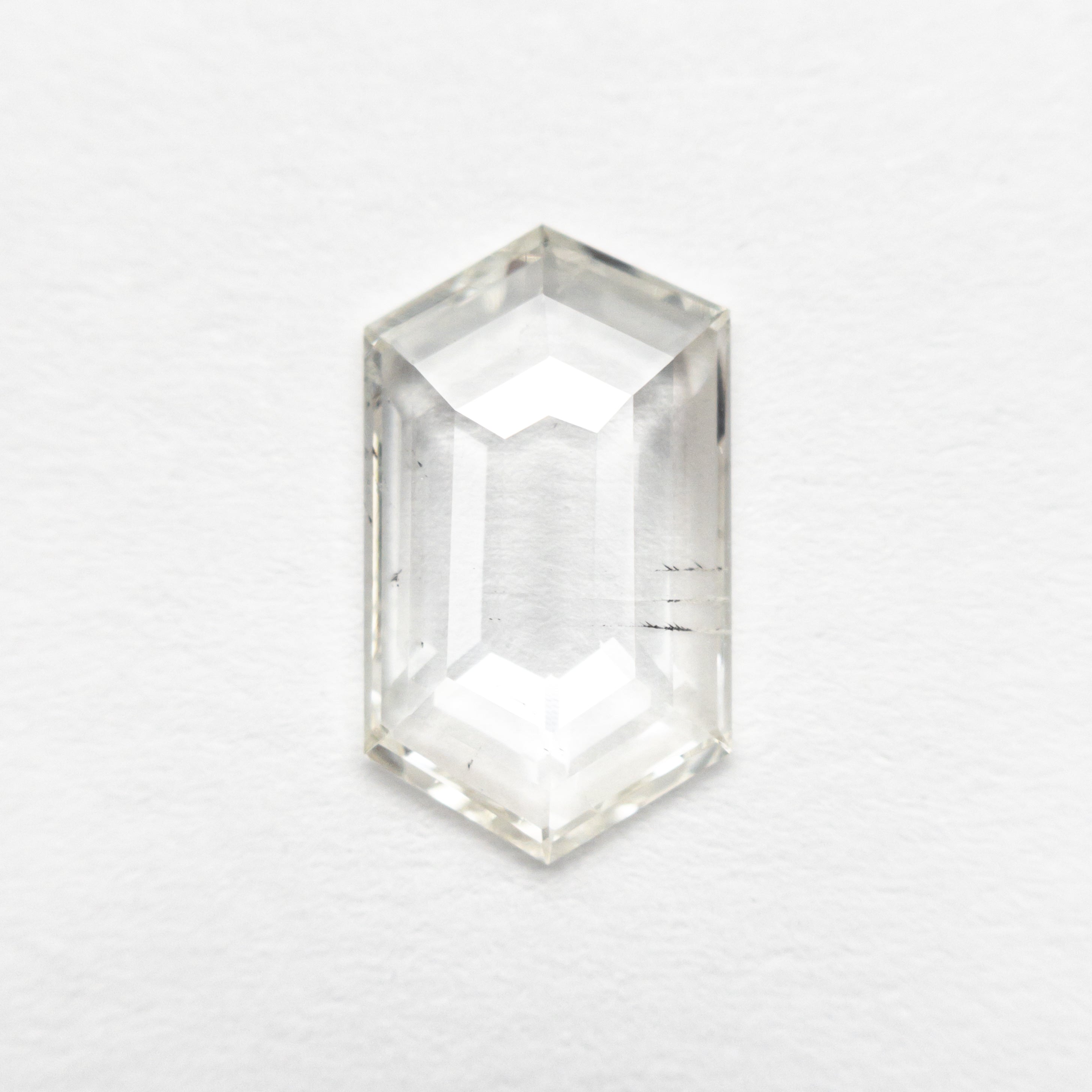 The 0.97ct 10.48x6.04x1.50mm I1 J Hexagon Rosecut 25133-01 by East London jeweller Rachel Boston | Discover our collections of unique and timeless engagement rings, wedding rings, and modern fine jewellery.
