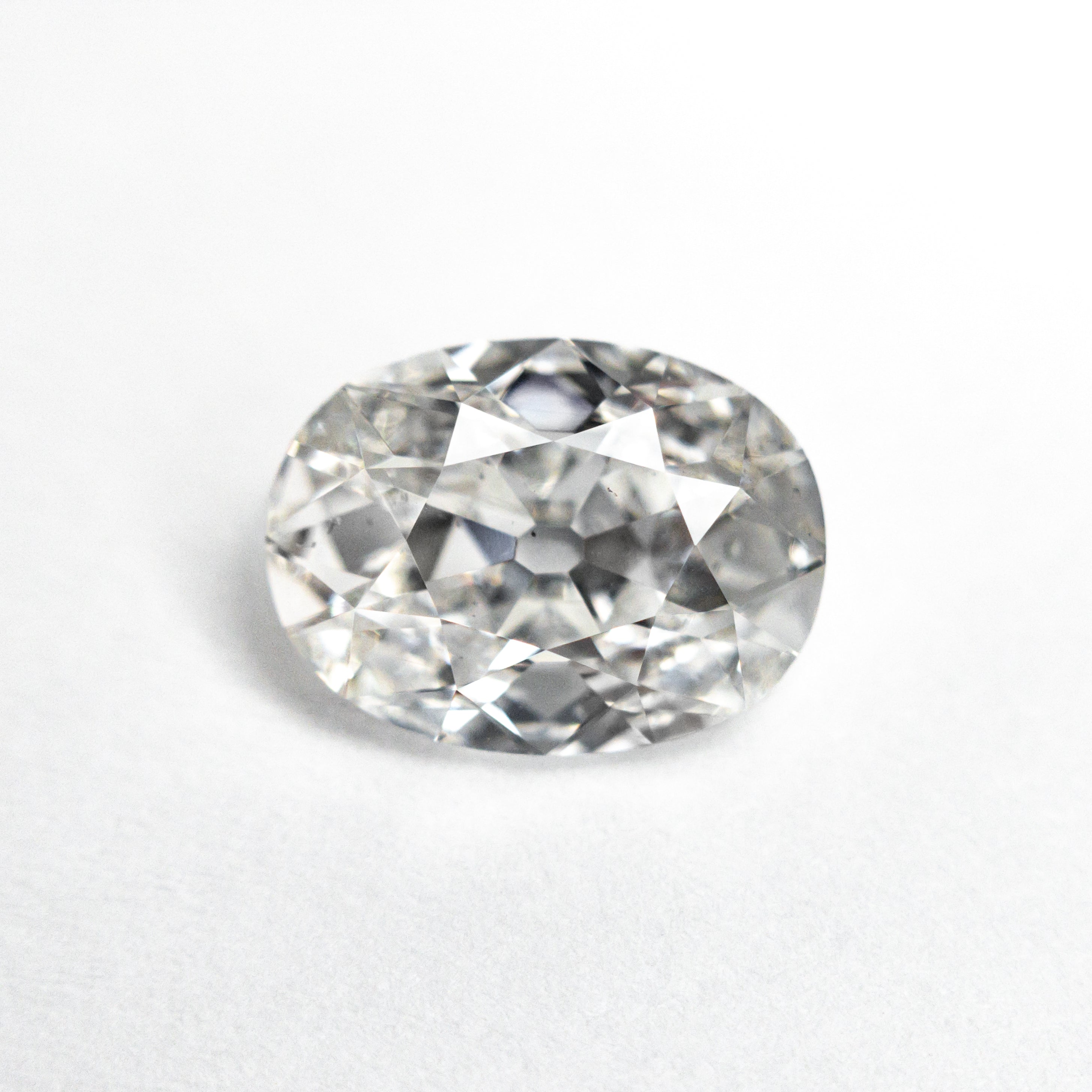 The 2.01ct 9.42x7.04x3.90mm GIA SI1 E Modern Antique Oval Brilliant 25159-01 by East London jeweller Rachel Boston | Discover our collections of unique and timeless engagement rings, wedding rings, and modern fine jewellery.